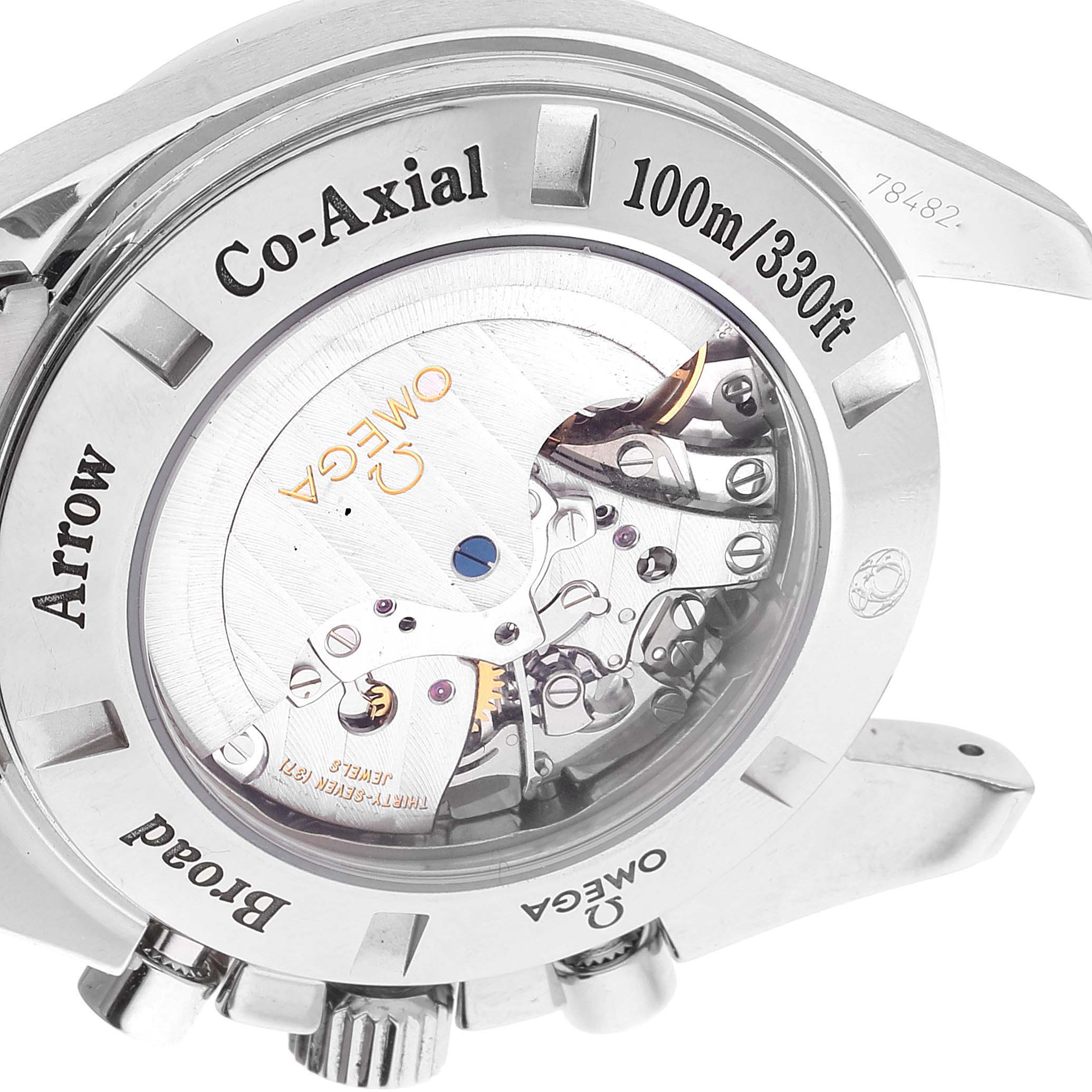 The image shows the back case of the Omega Speedmaster 321.10.44.50.01.001 Men's Stainless Steel Black Dial 321.10.44.50.01.001 Men's Stainless Steel Black Dial watch, highlighting its Co-Axial movement and internal mechanics.