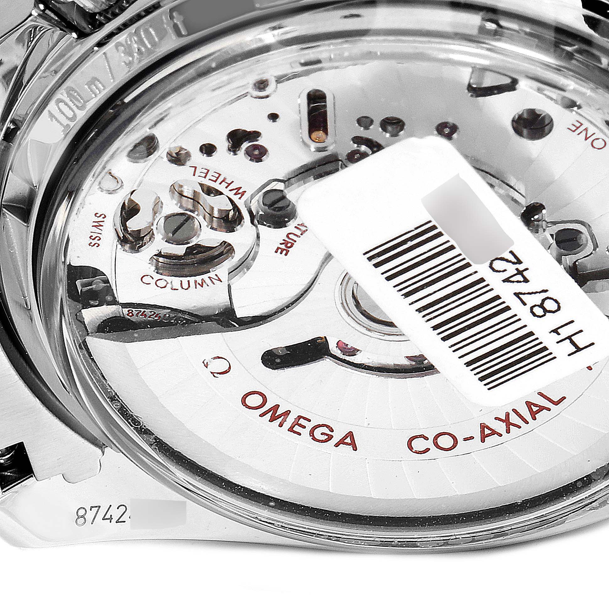 The image shows the back of the Omega Speedmaster 311.30.44.51.01.002 Men's Stainless Steel Black Dial 311.30.44.51.01.002 Men's Stainless Steel Black Dial watch, specifically highlighting its Co-Axial movement.