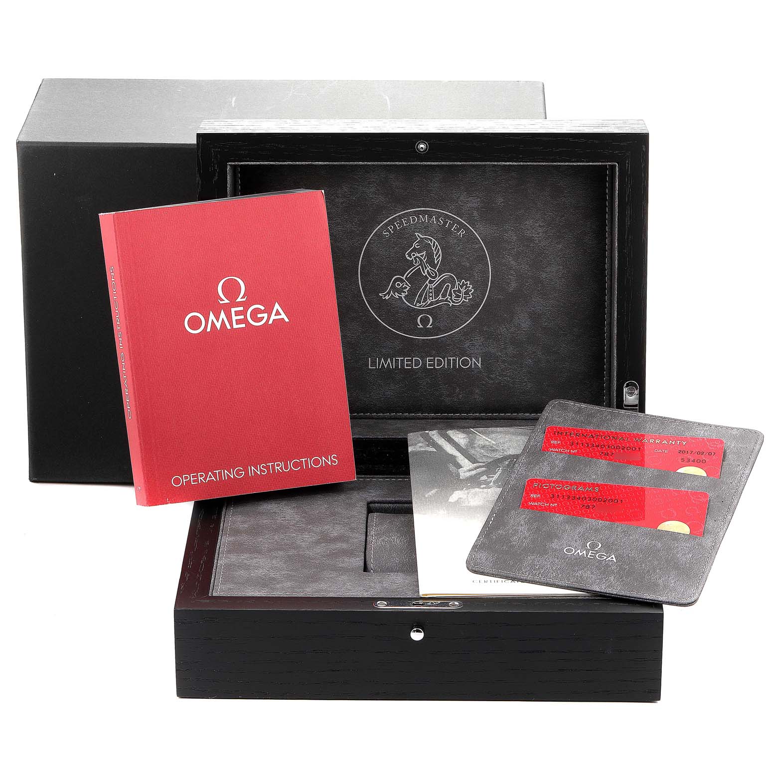 The image shows the Omega Speedmaster 311.33.40.30.02.001 Men's Stainless Steel Silver Dial 311.33.40.30.02.001 Men's Stainless Steel Silver Dial Limited Edition box, operating instructions, and warranty cards.