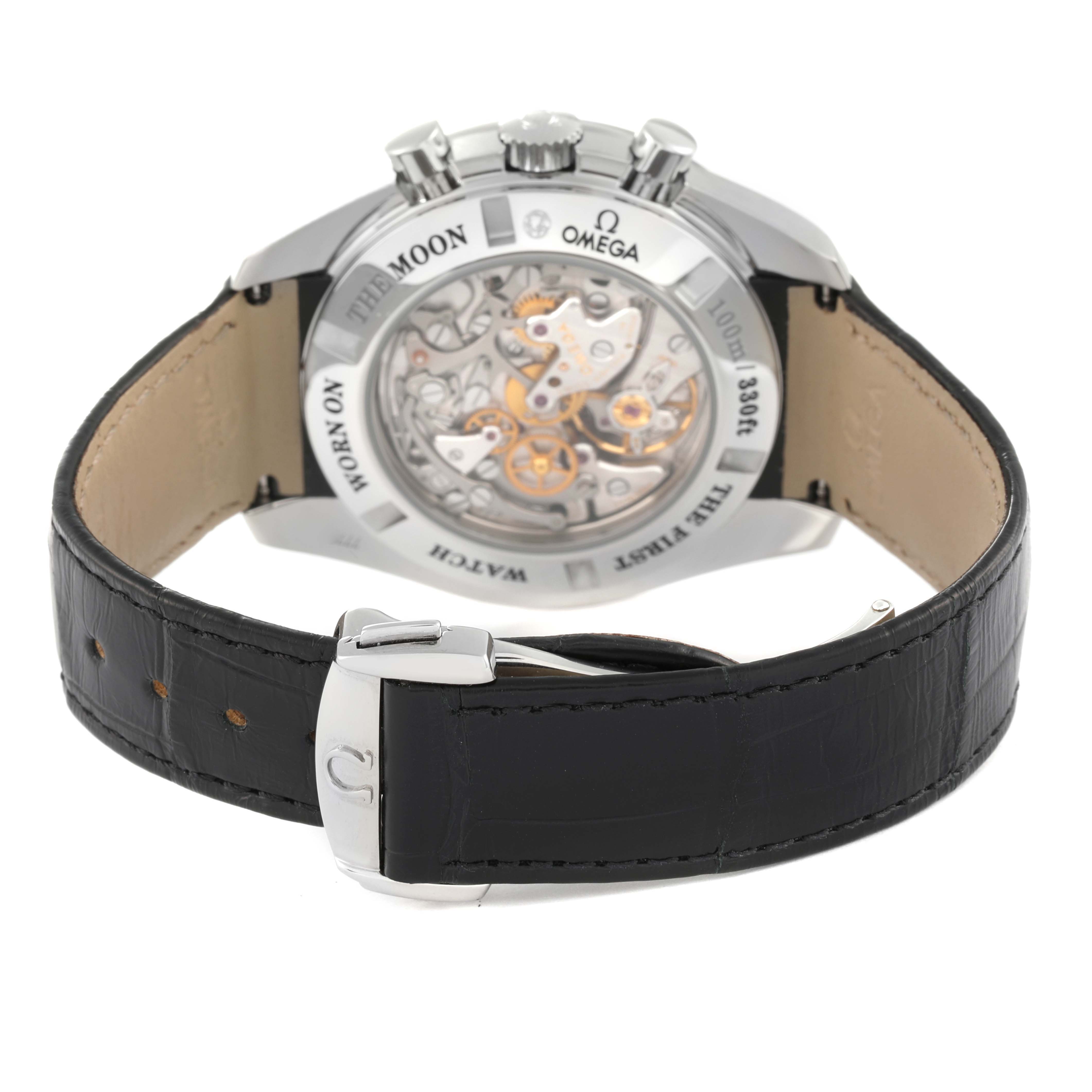 The image shows the back view of an Omega Speedmaster 311.33.44.32.01.001 Men's Stainless Steel Black Dial 311.33.44.32.01.001 Men's Stainless Steel Black Dial watch, highlighting its transparent case back and black leather strap.