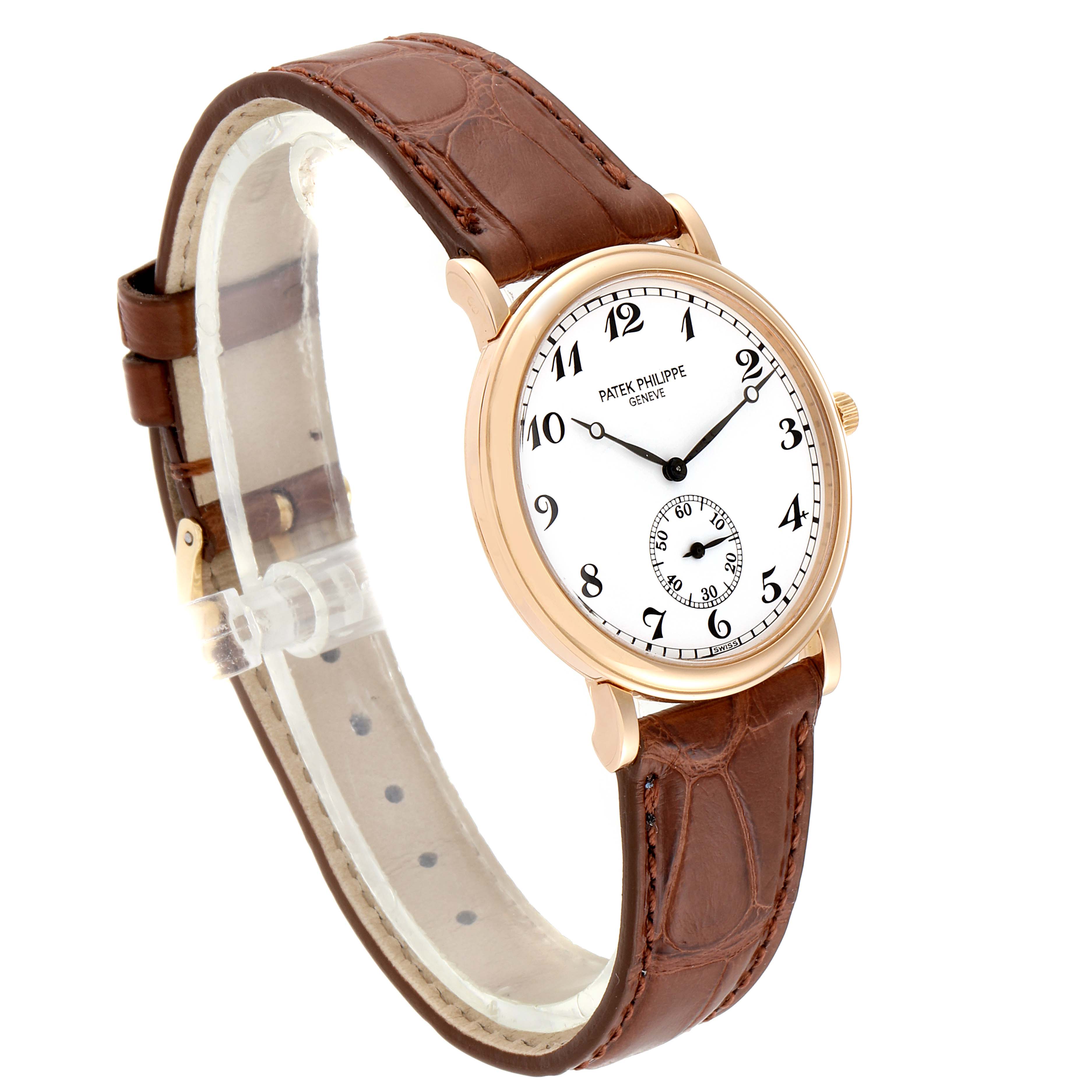 The image shows a side angle of the Patek Philippe Calatrava 5022 Men's Rose Gold White Dial 5022 Men's Rose Gold White Dial watch, featuring the face, strap, and case.