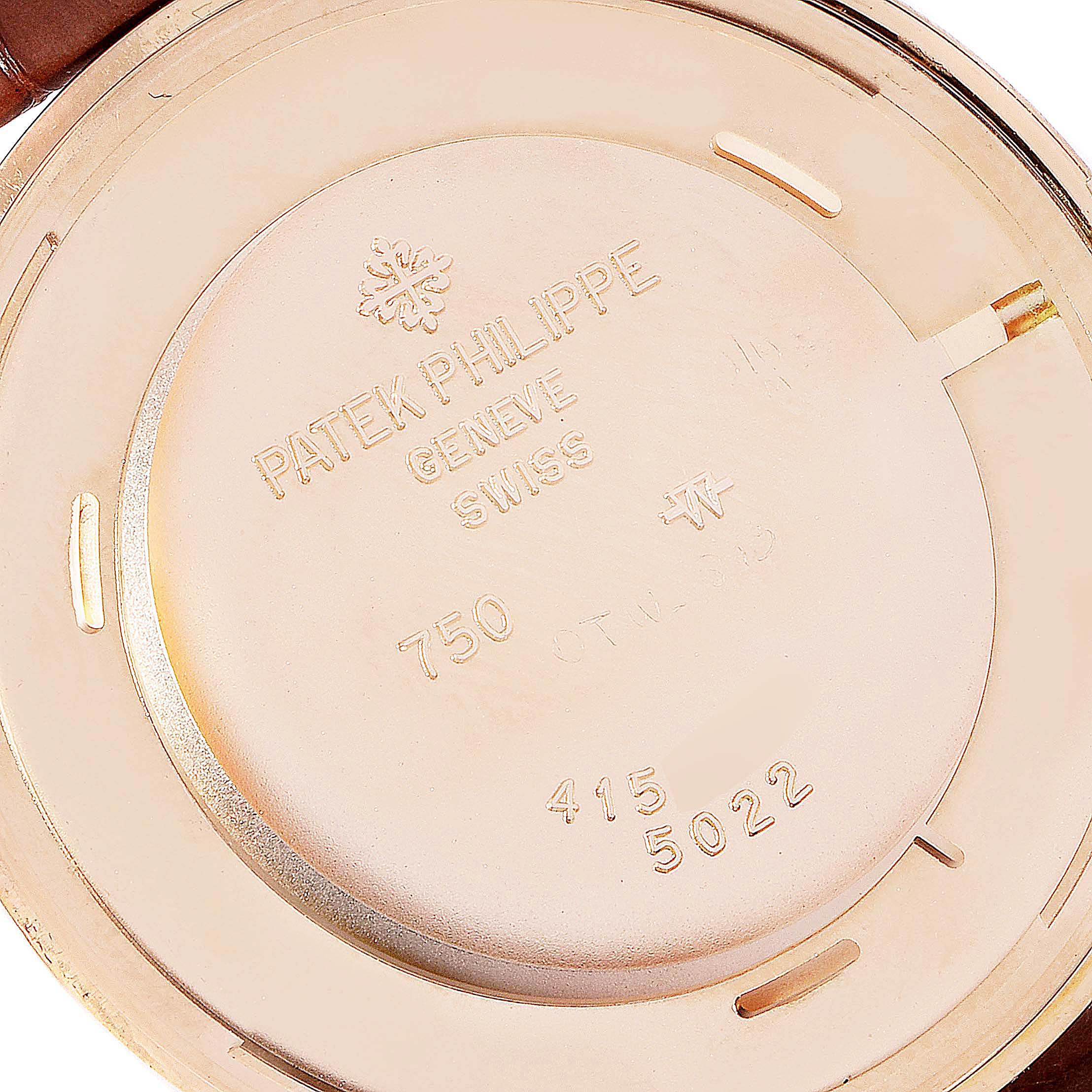The image shows the engraved case back of a Patek Philippe Calatrava 5022 Men's Rose Gold White Dial 5022 Men's Rose Gold White Dial watch viewed from the inside.
