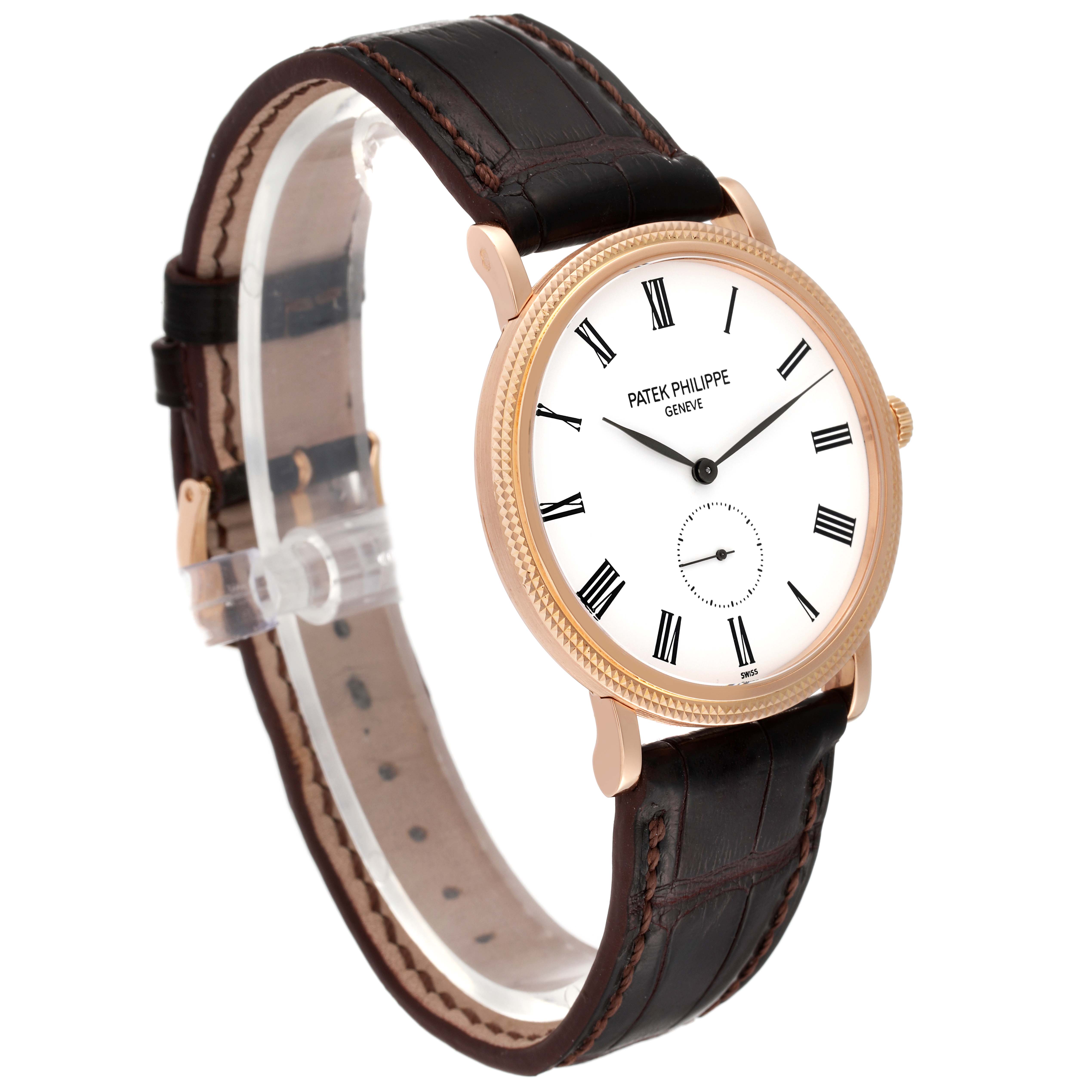 The image shows the Patek Philippe Calatrava 5119R Men's Rose Gold White Dial 5119R Men's Rose Gold White Dial watch at a three-quarter angle, highlighting its face, leather strap, and crown.