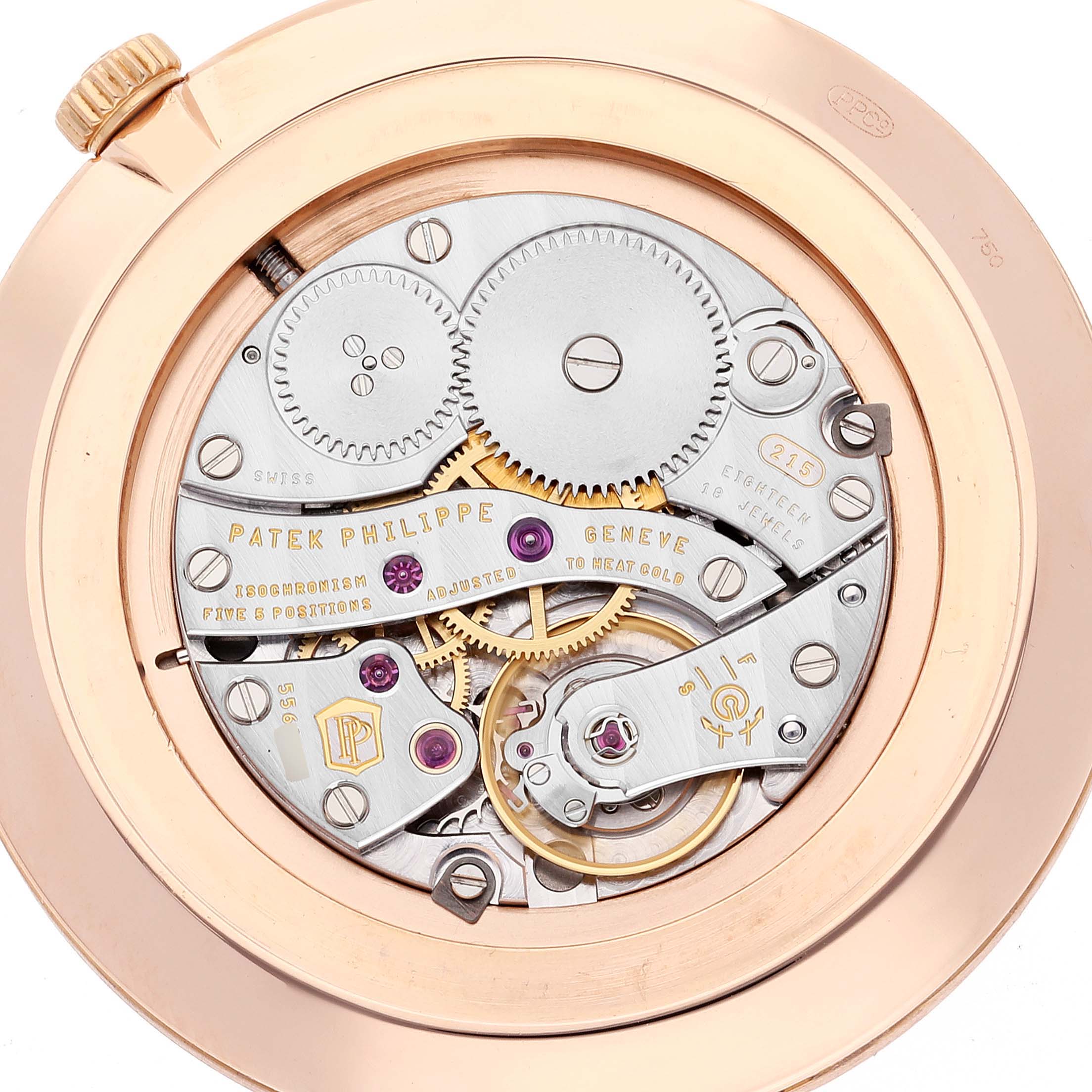 This image shows the back of a Patek Philippe Calatrava 5119R Men's Rose Gold White Dial 5119R Men's Rose Gold White Dial watch, revealing its intricate mechanical movement.
