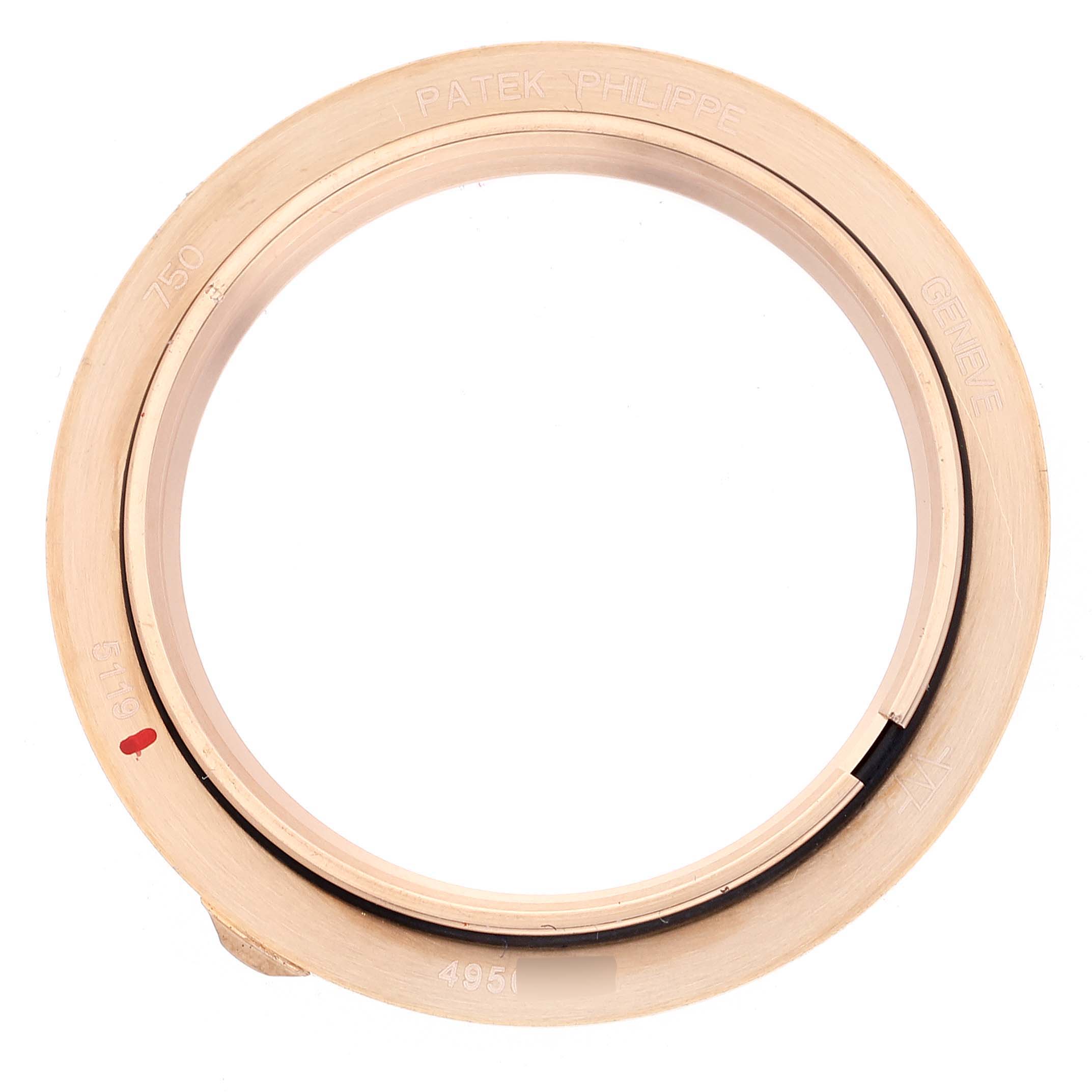 The image shows a close-up of the bezel of a Patek Philippe Calatrava 5119R Men's Rose Gold White Dial 5119R Men's Rose Gold White Dial watch.