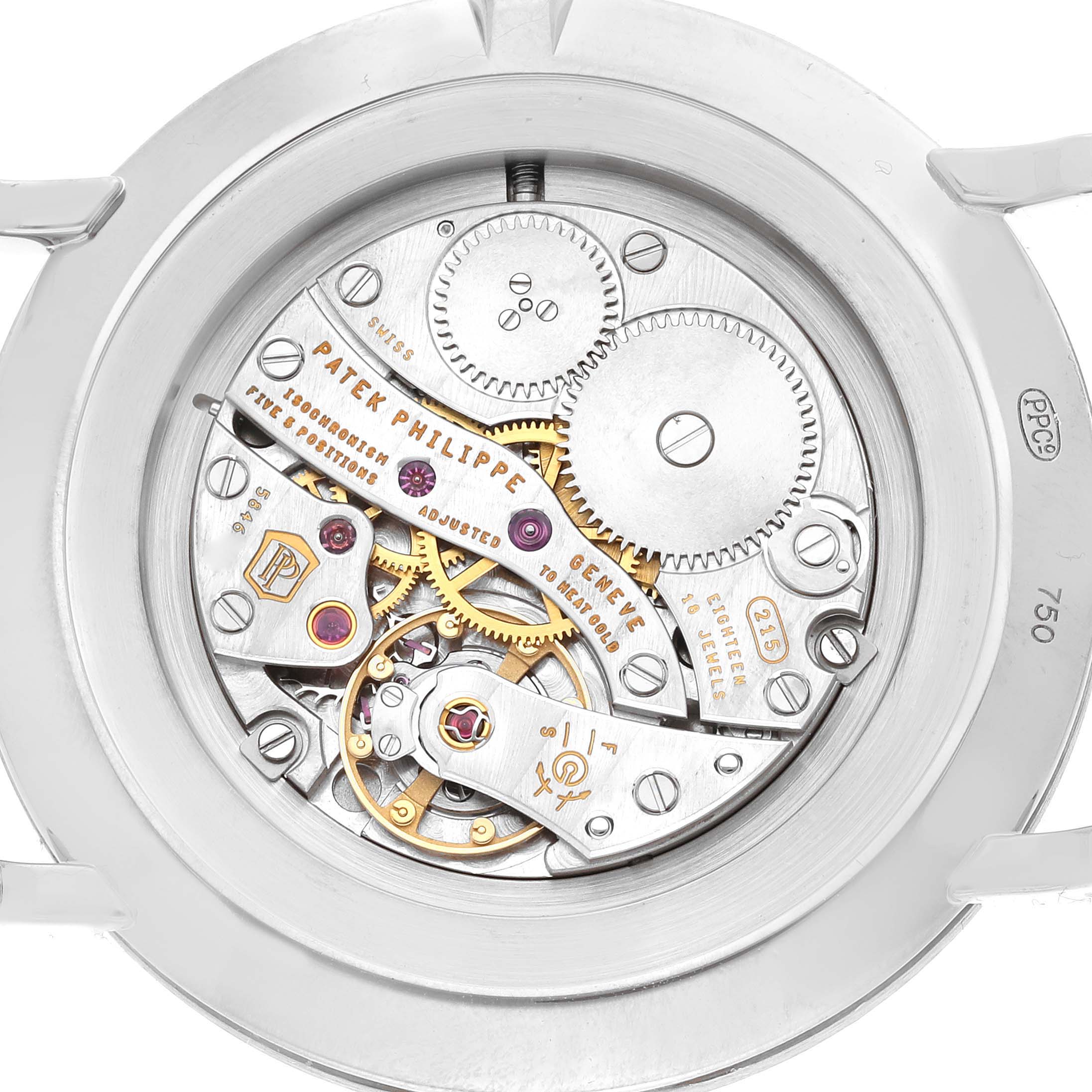The image shows the intricate movements and gears of a Patek Philippe Calatrava 5119G-001 Men's White Gold White Dial 5119G-001 Men's White Gold White Dial watch from a rear, open caseback angle.