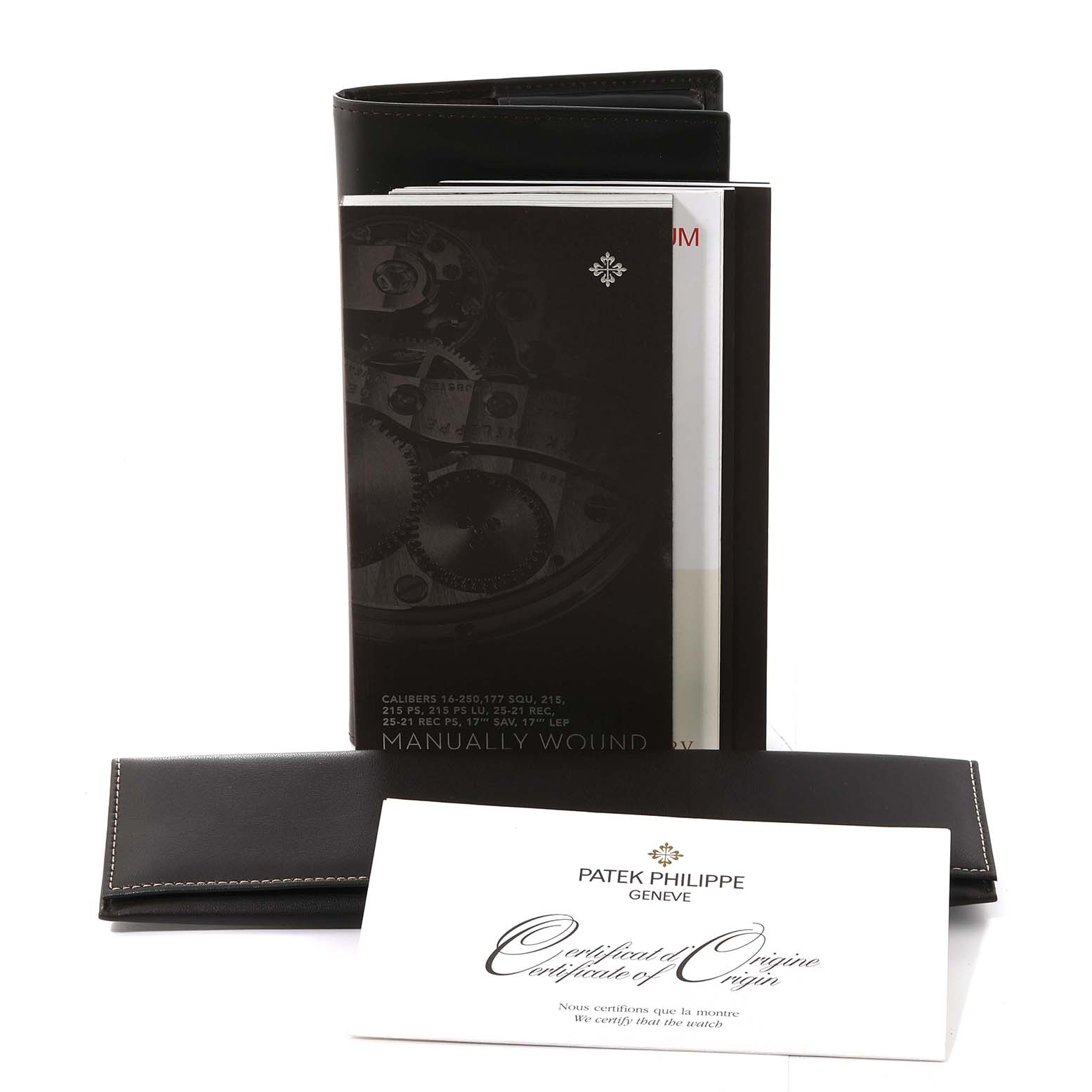 The image shows the documentation and accessories for a Patek Philippe Calatrava 5119G-001 Men's White Gold White Dial 5119G-001 Men's White Gold White Dial watch, including manuals, a leather case, and a certificate.