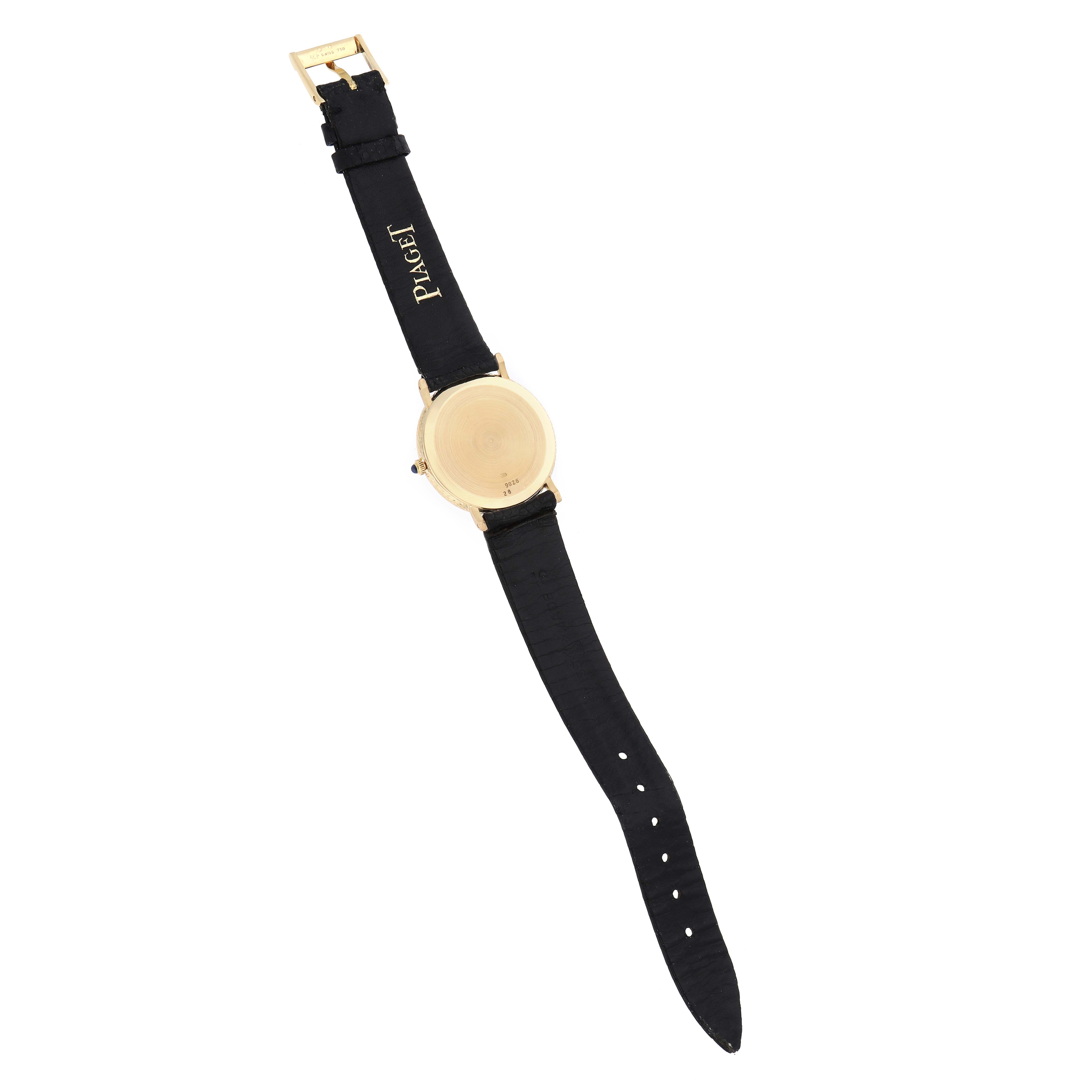 The Piaget 9026 Women's Yellow Gold Black Dial Dancer Vintage 9026 is shown from a back angled view, highlighting the strap and clasp.