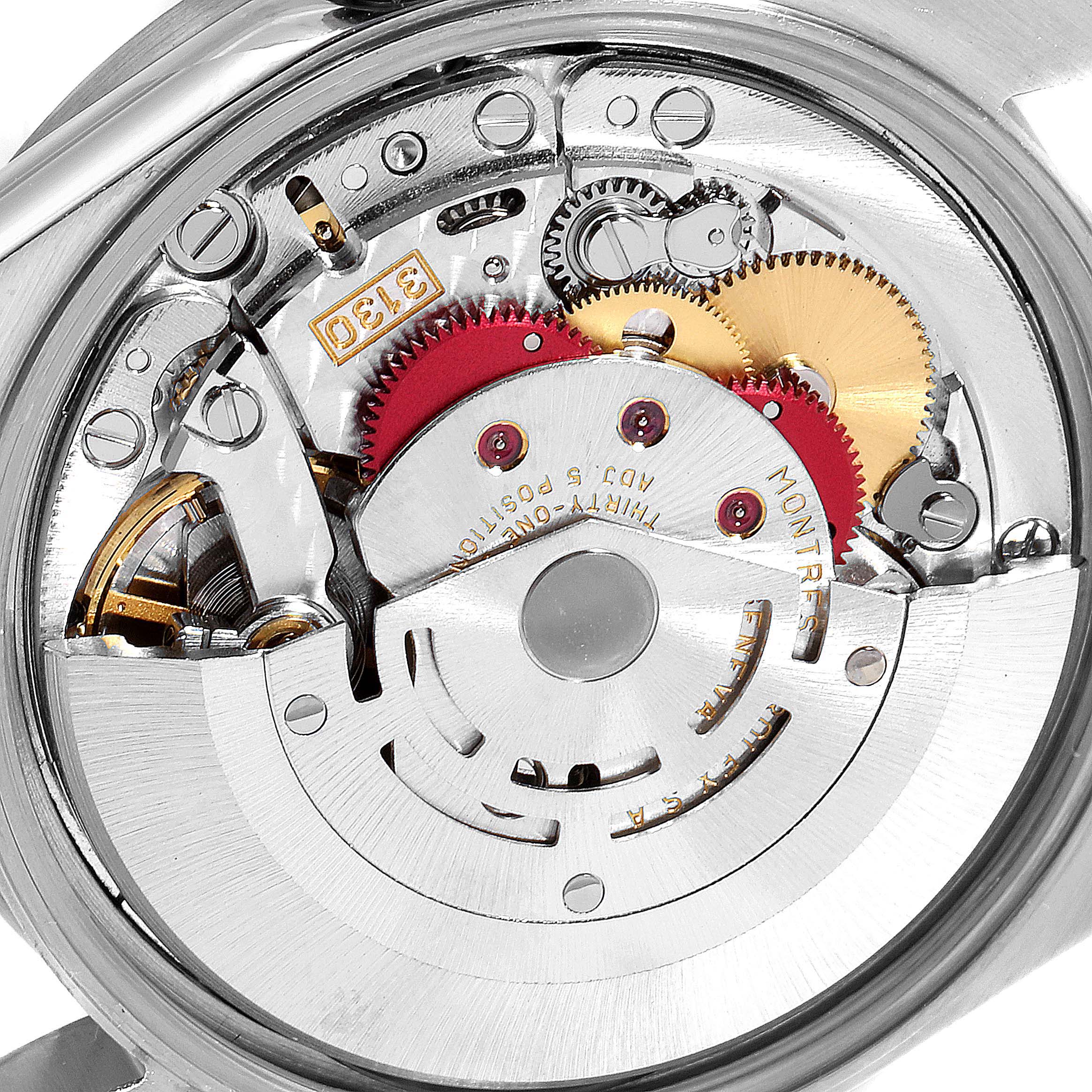 This image shows the inner mechanical movement of a Rolex Air-King 14010 Men's Stainless Steel Blue Dial 14010 Men's Stainless Steel Blue Dial watch with visible gears and components.