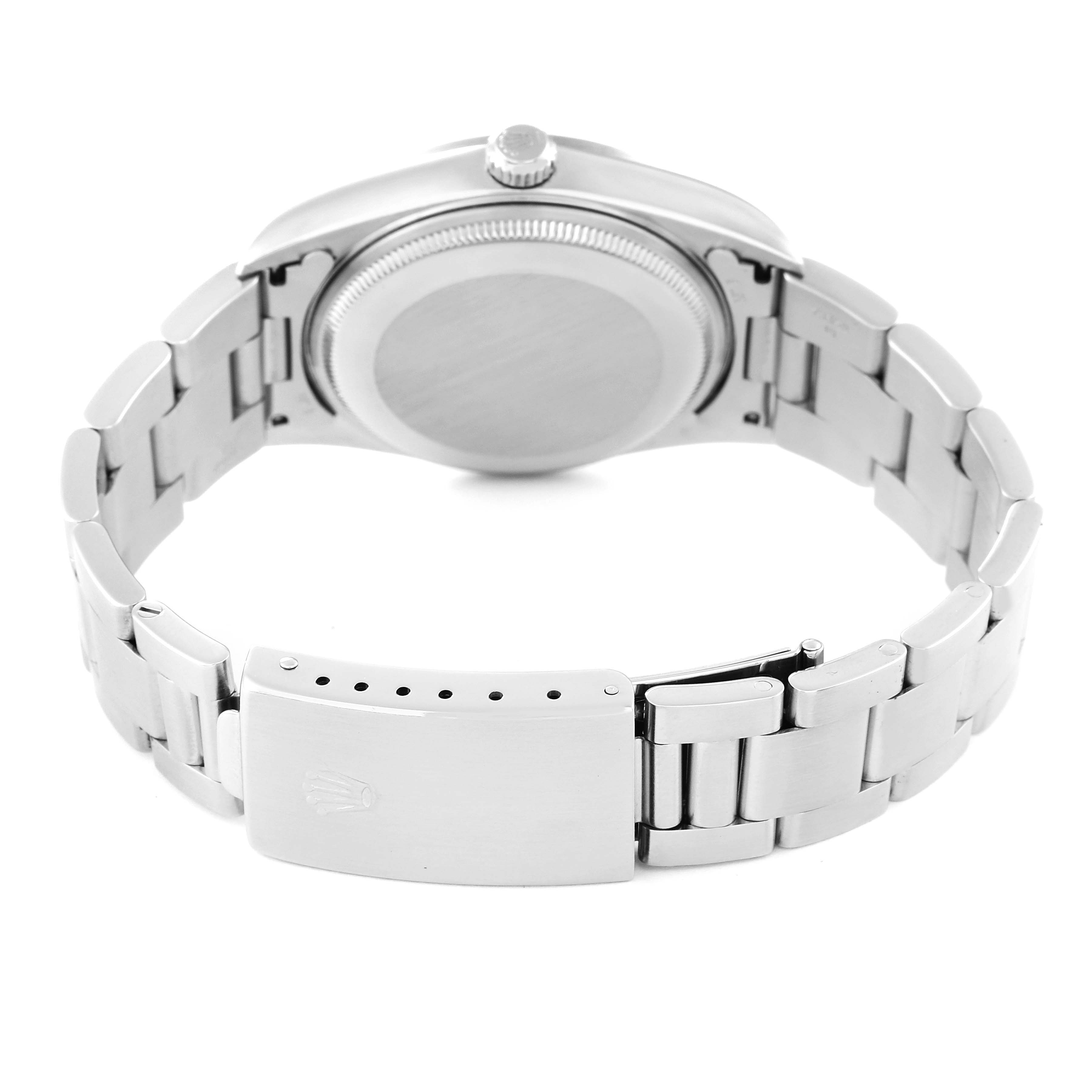 The image shows the back view of a Rolex Air-King 14000 Men's Stainless Steel Blue Dial 14000 Men's Stainless Steel Blue Dial watch, focusing on the case back and the bracelet with the clasp.