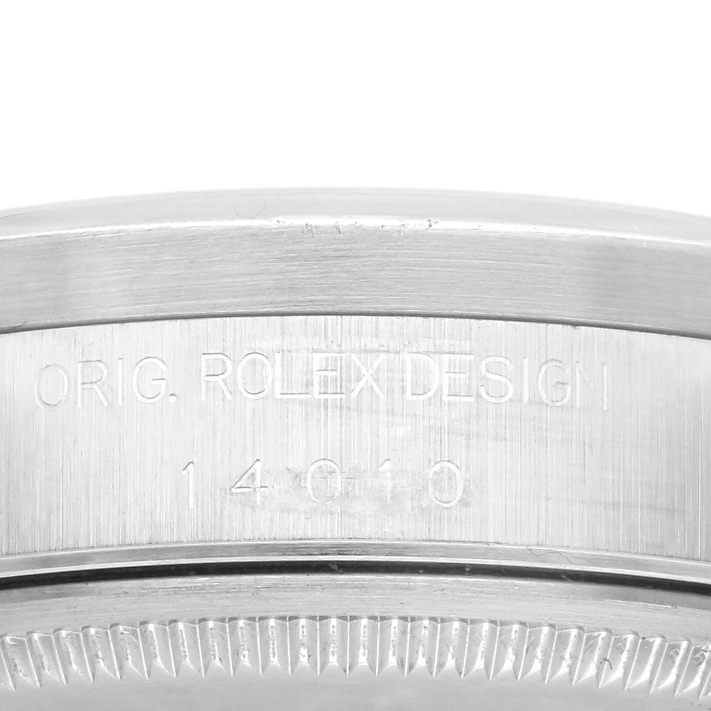 This image shows a close-up of the casing side of the Rolex Air-King 14010 Men's Stainless Steel Silver Dial 14010 Men's Stainless Steel Silver Dial watch, displaying its model number and design engraving.