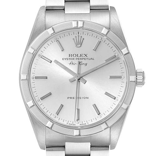 The Rolex Air-King watch is shown from a head-on angle, highlighting its dial, bezel, and part of the bracelet.