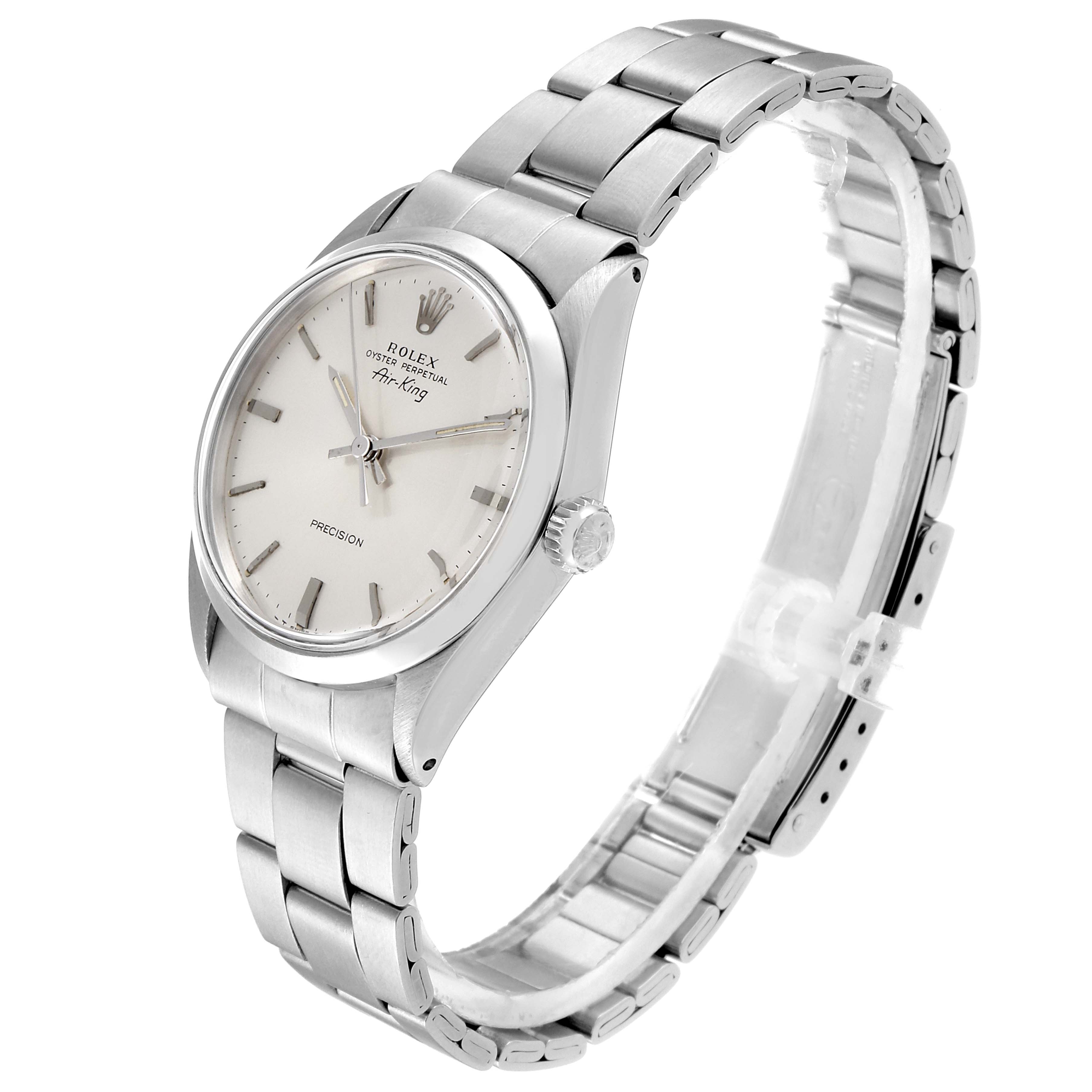 This image shows a side-angle view of the Vintage Collection Rolex watch, highlighting its face, crown, and bracelet.