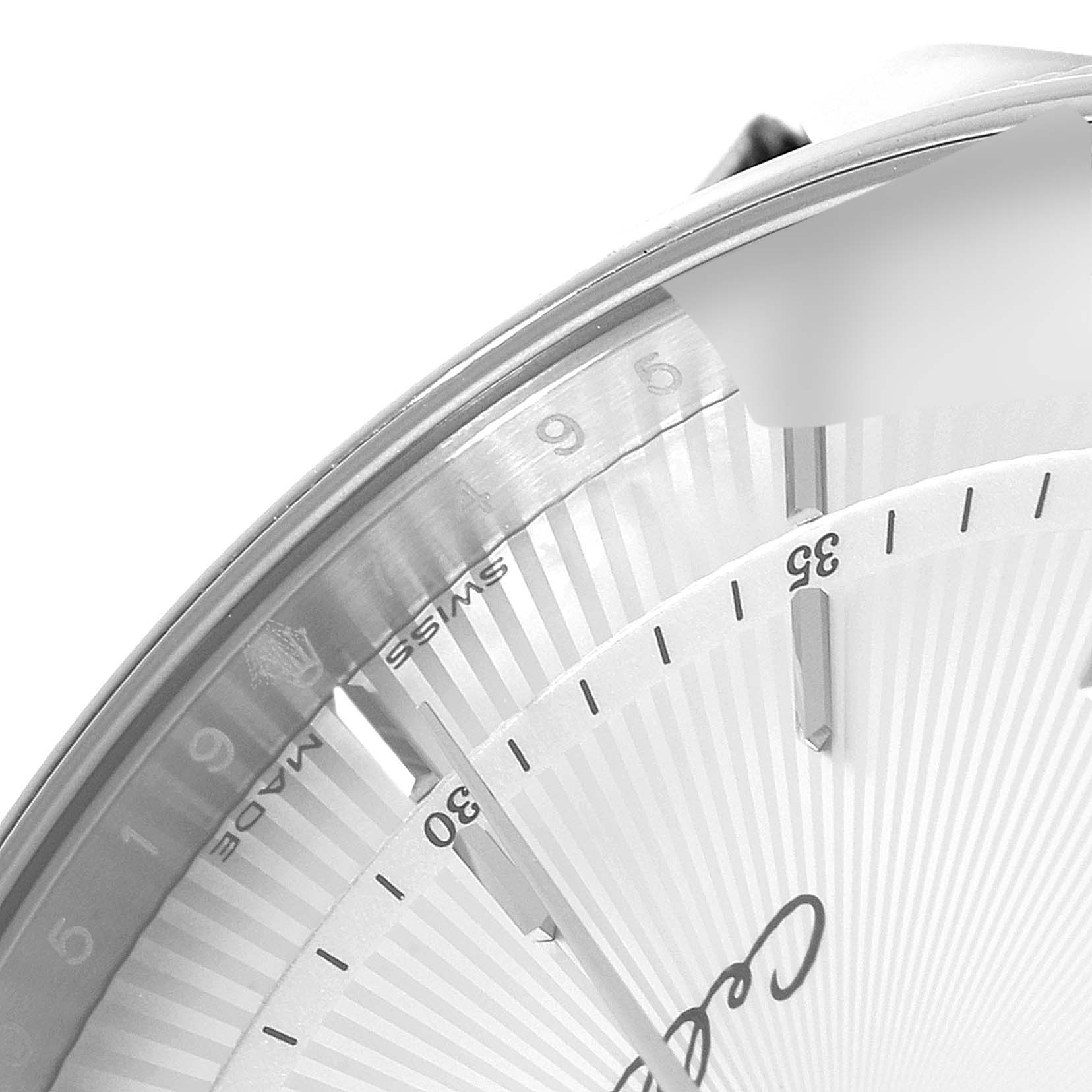 This image shows a close-up of the dial and bezel of a Rolex Cellini 50519 Men
s White Gold Silver Dial 50519 Men
s White Gold Silver Dial watch, featuring the 1950s era and "Swiss Made" text.