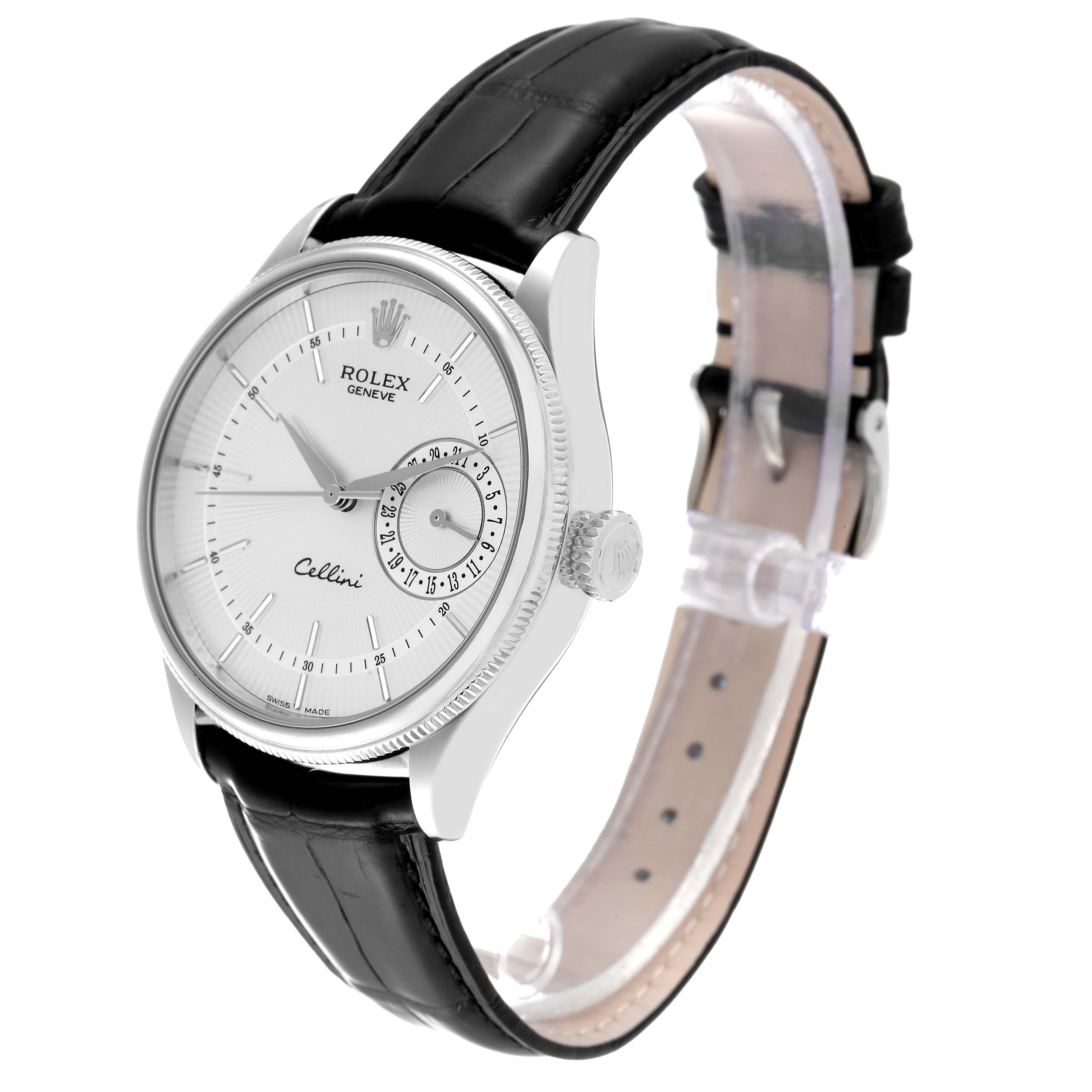 The Rolex Cellini 50519 Men
s White Gold Silver Dial 50519 Men
s White Gold Silver Dial watch is shown at a slight angle, revealing its silver case, white dial, and black leather strap.