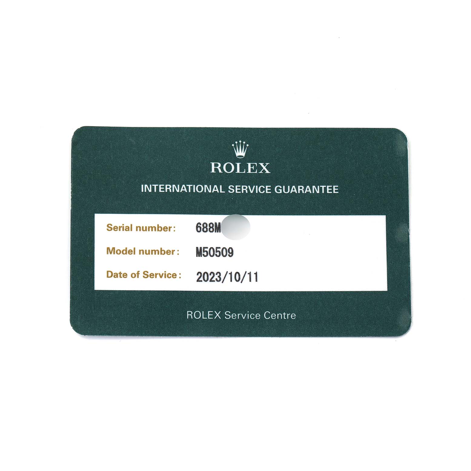 The image shows a Rolex Cellini M50509 Men's White Gold Black Dial service guarantee card, featuring serial and model numbers with a service date.