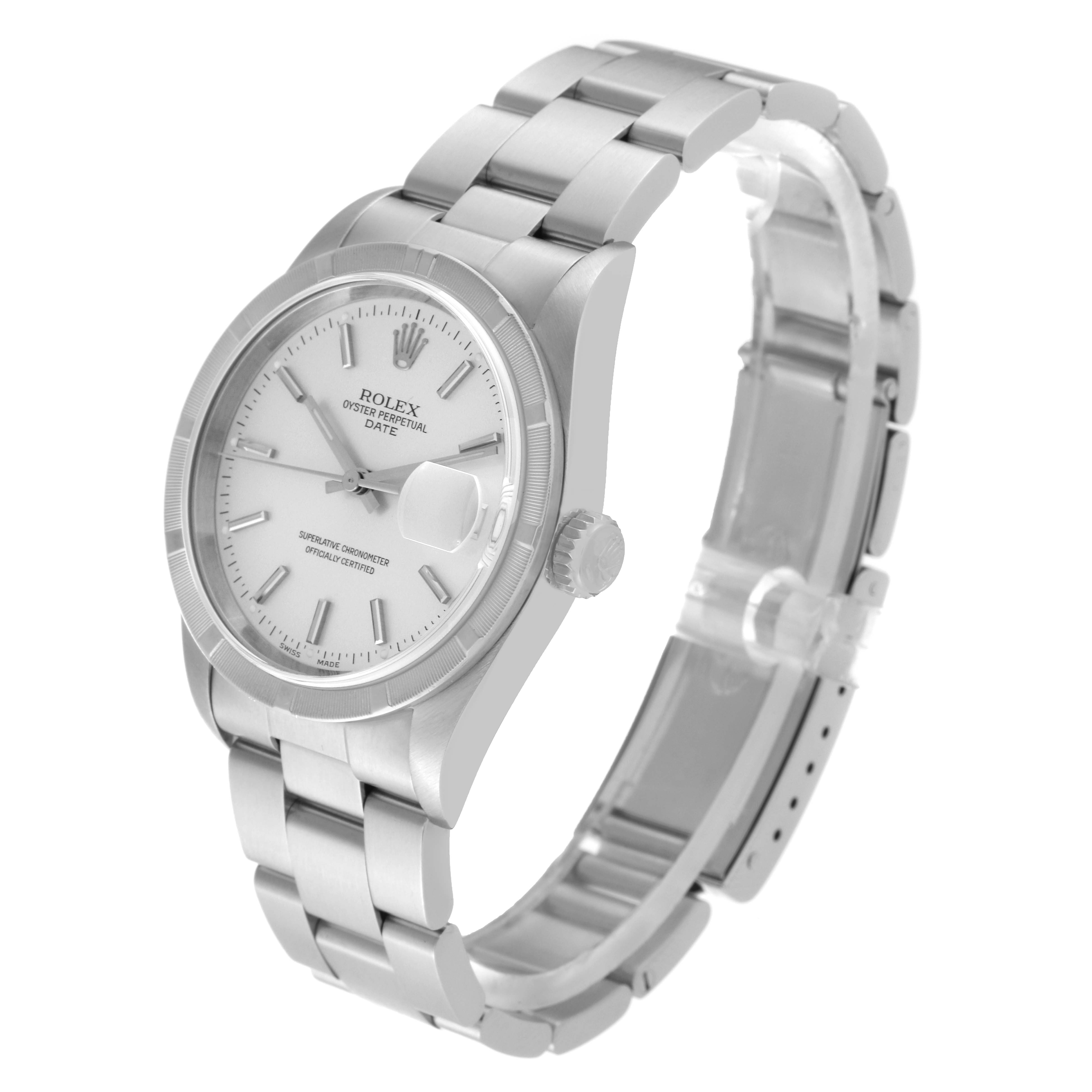 The Rolex Date 15210 Men
s Stainless Steel Silver Dial 15210 Men
s Stainless Steel Silver Dial watch is shown at an angled view displaying the dial, case, crown, and bracelet.