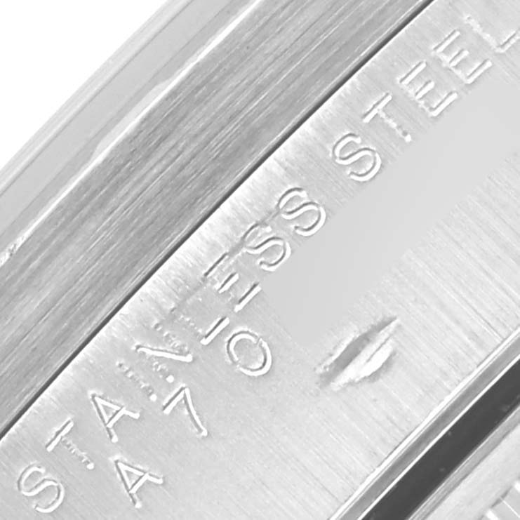This image shows a close-up of the engraved inner caseback of a Rolex Date 15210 Men
s Stainless Steel Silver Dial 15210 Men
s Stainless Steel Silver Dial model watch.