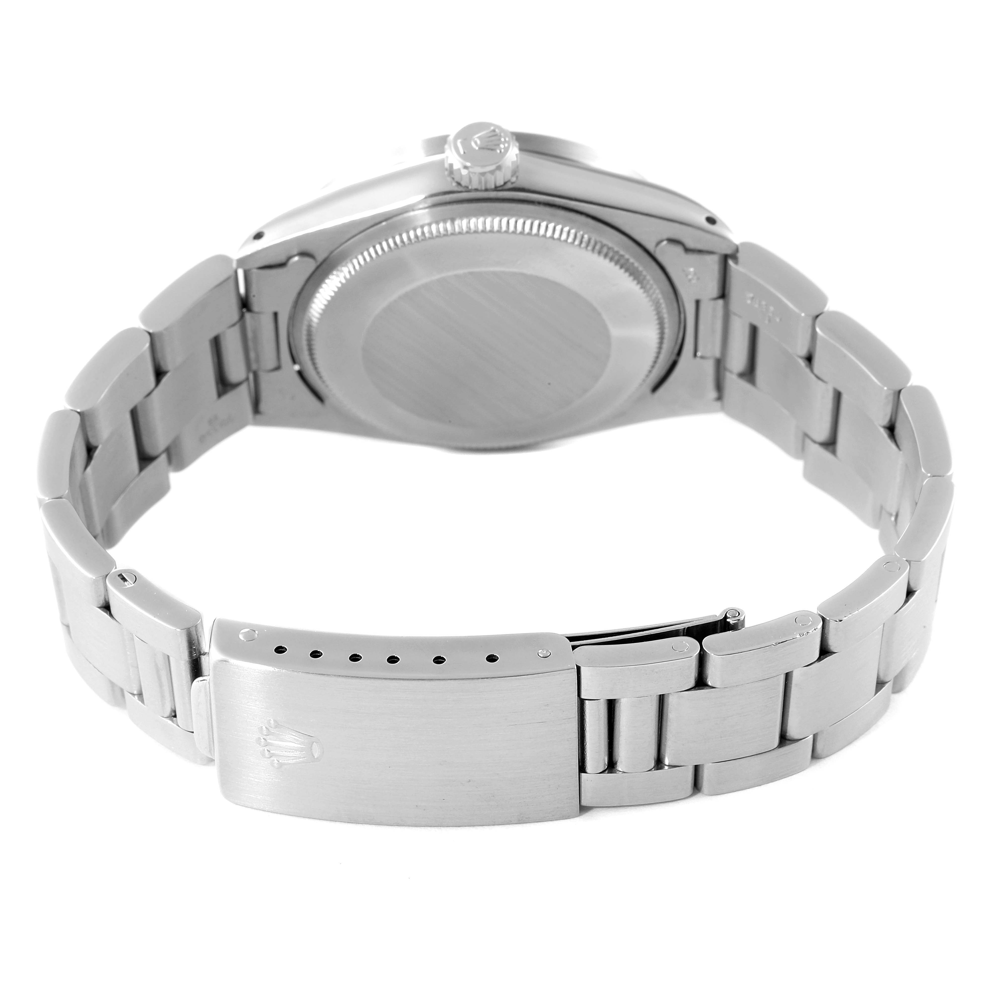 The image shows the back view of the Rolex Vintage Collection 15010 Men's Stainless Steel Silver Dial 15010 Men's Stainless Steel Silver Dial watch, highlighting its caseback, crown, and stainless steel bracelet with clasp.