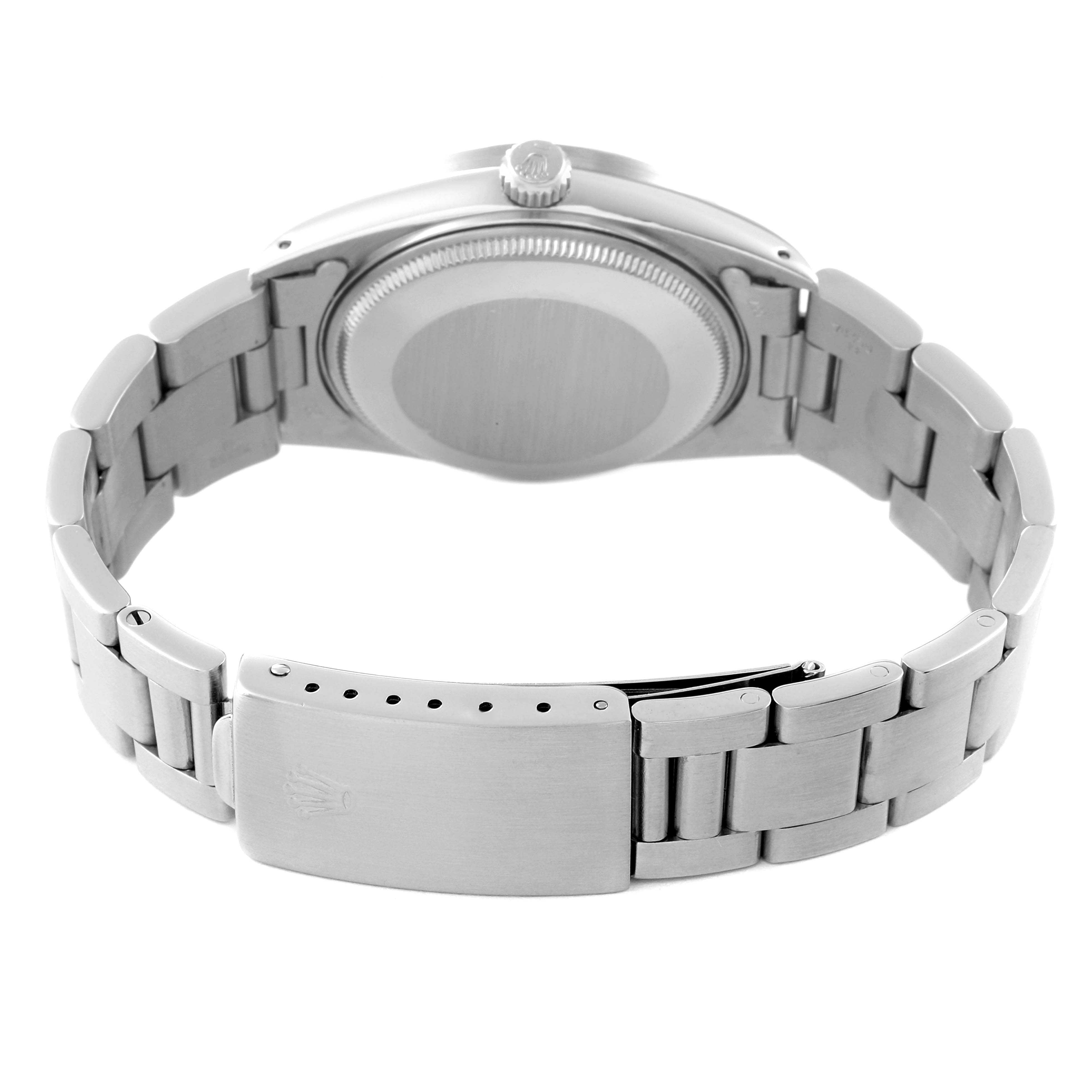This image shows the back and bracelet of a Rolex Vintage Collection 15010 Men's Stainless Steel Silver Dial 15010 Men's Stainless Steel Silver Dial model, along with the clasp and crown.