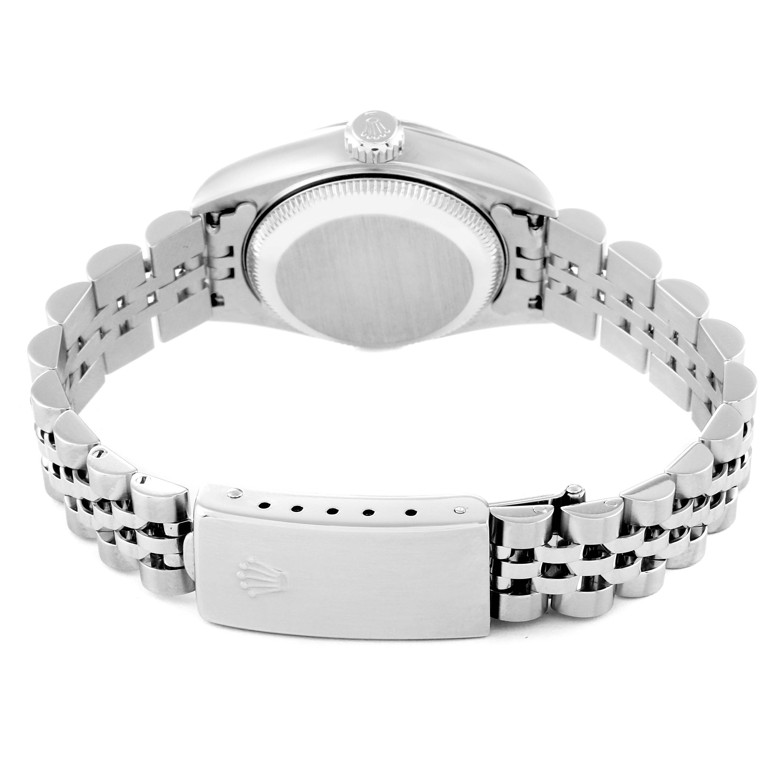 This Rolex Datejust 79174 Women's Stainless Steel Black Dial 79174 Women's Stainless Steel Black Dial watch is shown from a rear angle, highlighting the case back, bracelet, and clasp.