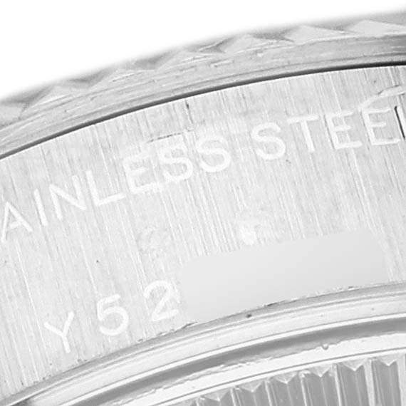 This is a close-up image of the case back of the Rolex Datejust 79174 Women's Stainless Steel Black Dial 79174 Women's Stainless Steel Black Dial, showing the stainless steel engraving.