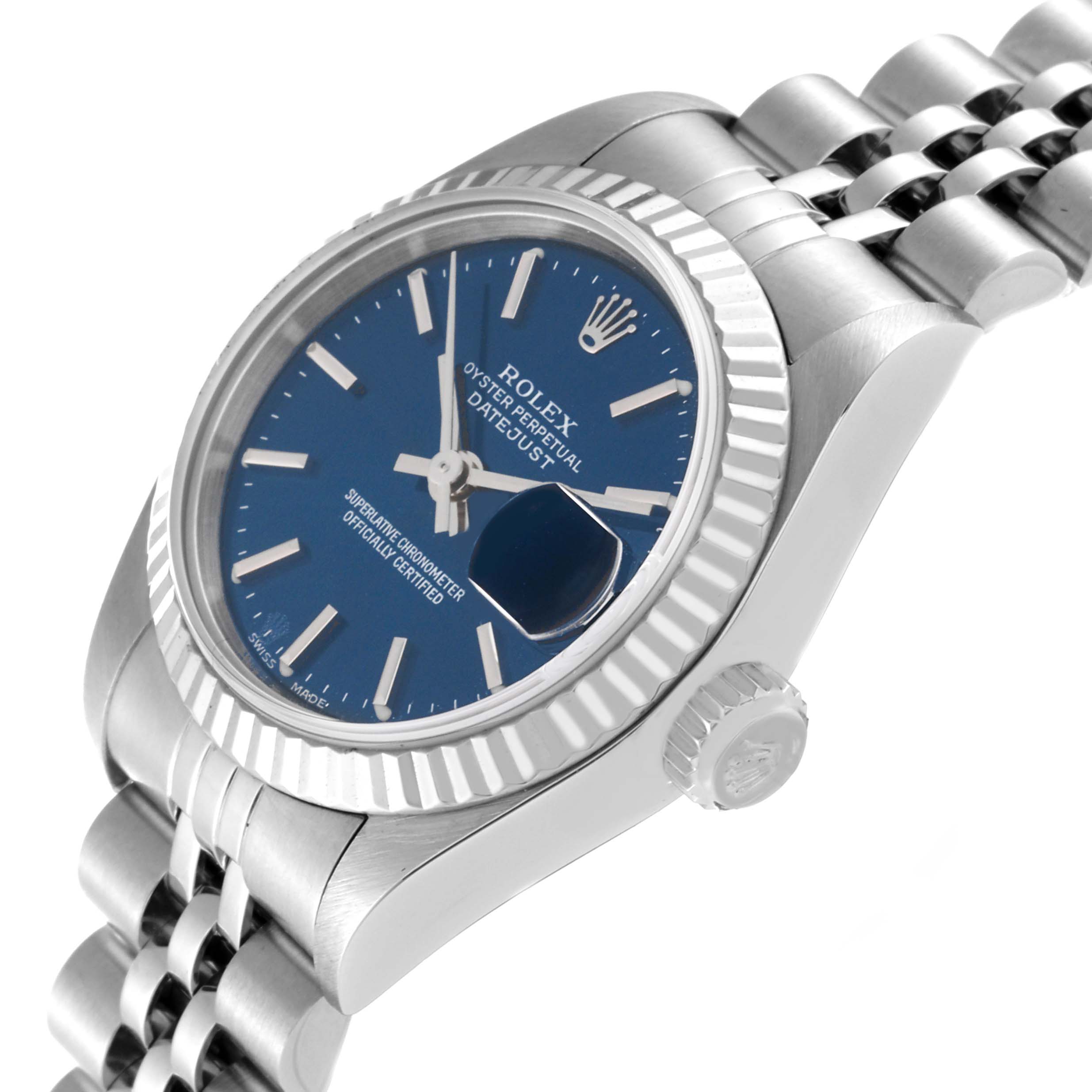 The Rolex Datejust 79174 Women's Stainless Steel Blue Dial 79174 Women's Stainless Steel Blue Dial watch is shown at a slight tilt, showcasing the face, fluted bezel, crown, and part of the Jubilee bracelet.