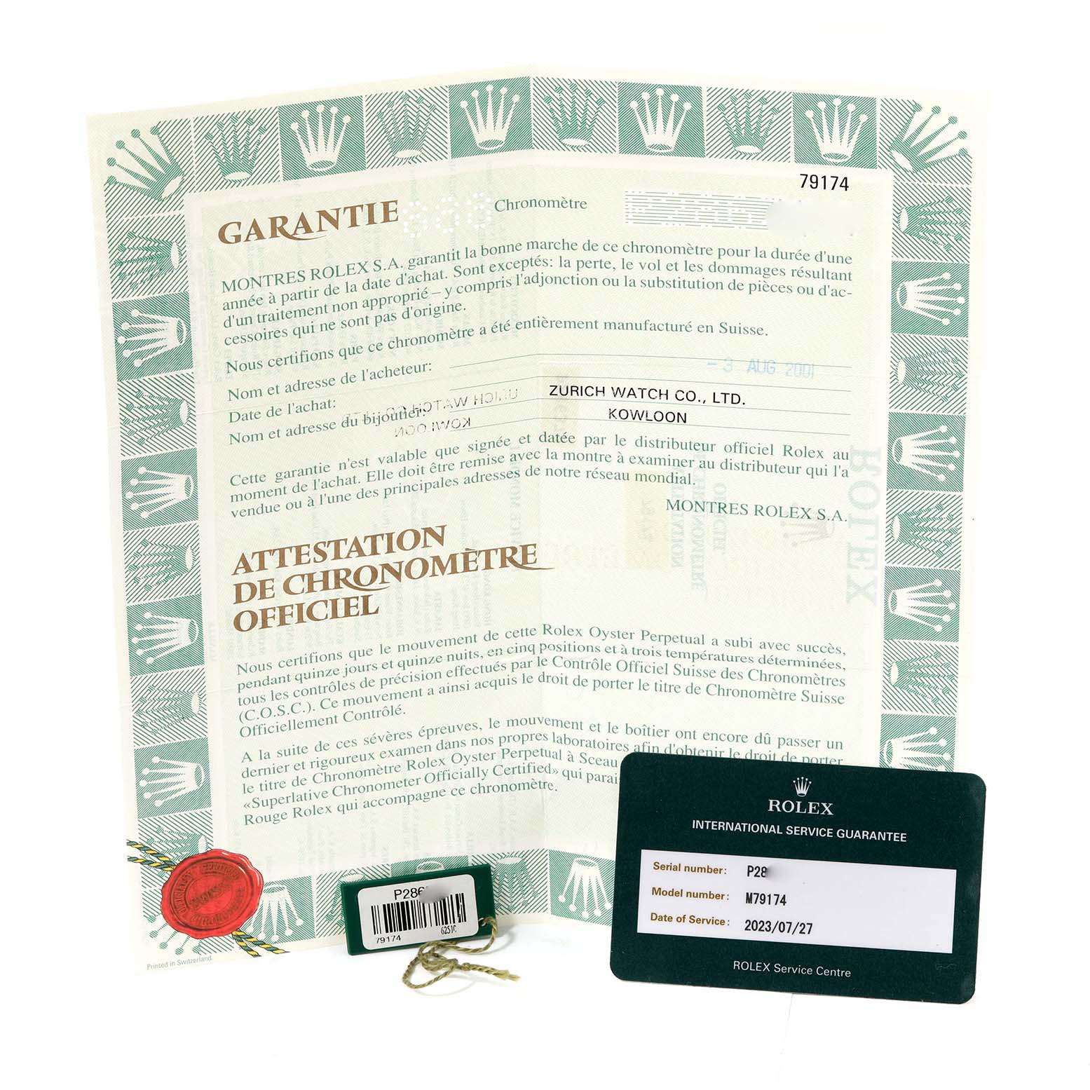 The image shows the warranty papers and certification for a Rolex Datejust 79174 Women's Stainless Steel Blue Dial 79174 Women's Stainless Steel Blue Dial watch.