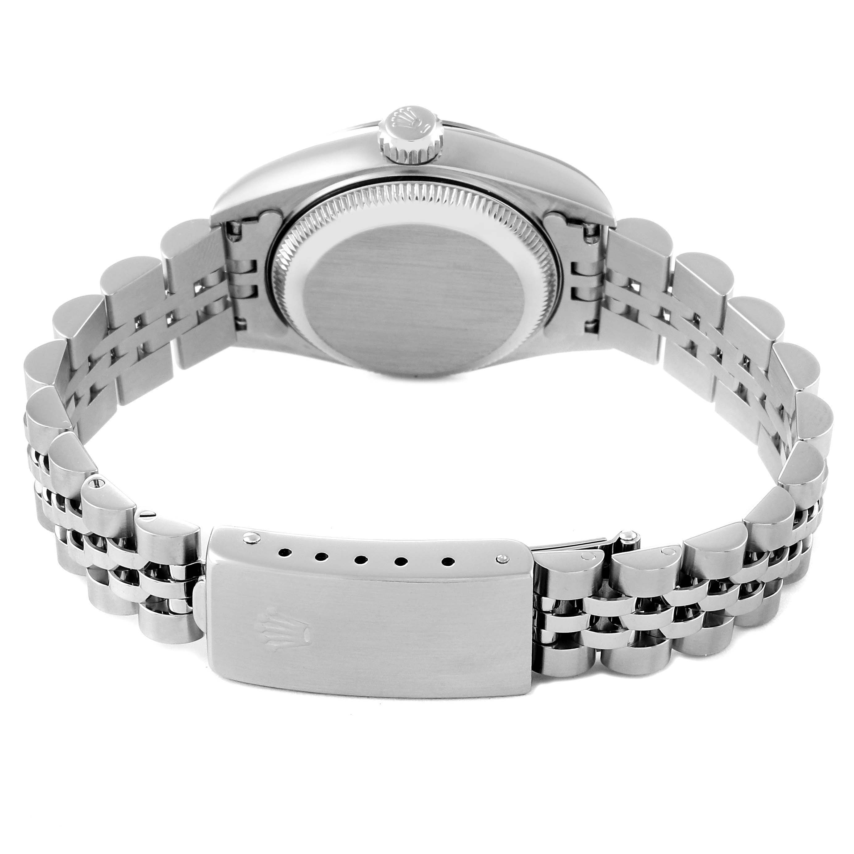 This image shows the backside of a Rolex Datejust 69174 Women's Stainless Steel White Dial 69174 Women's Stainless Steel White Dial, including the case back, crown, and bracelet with the clasp open.