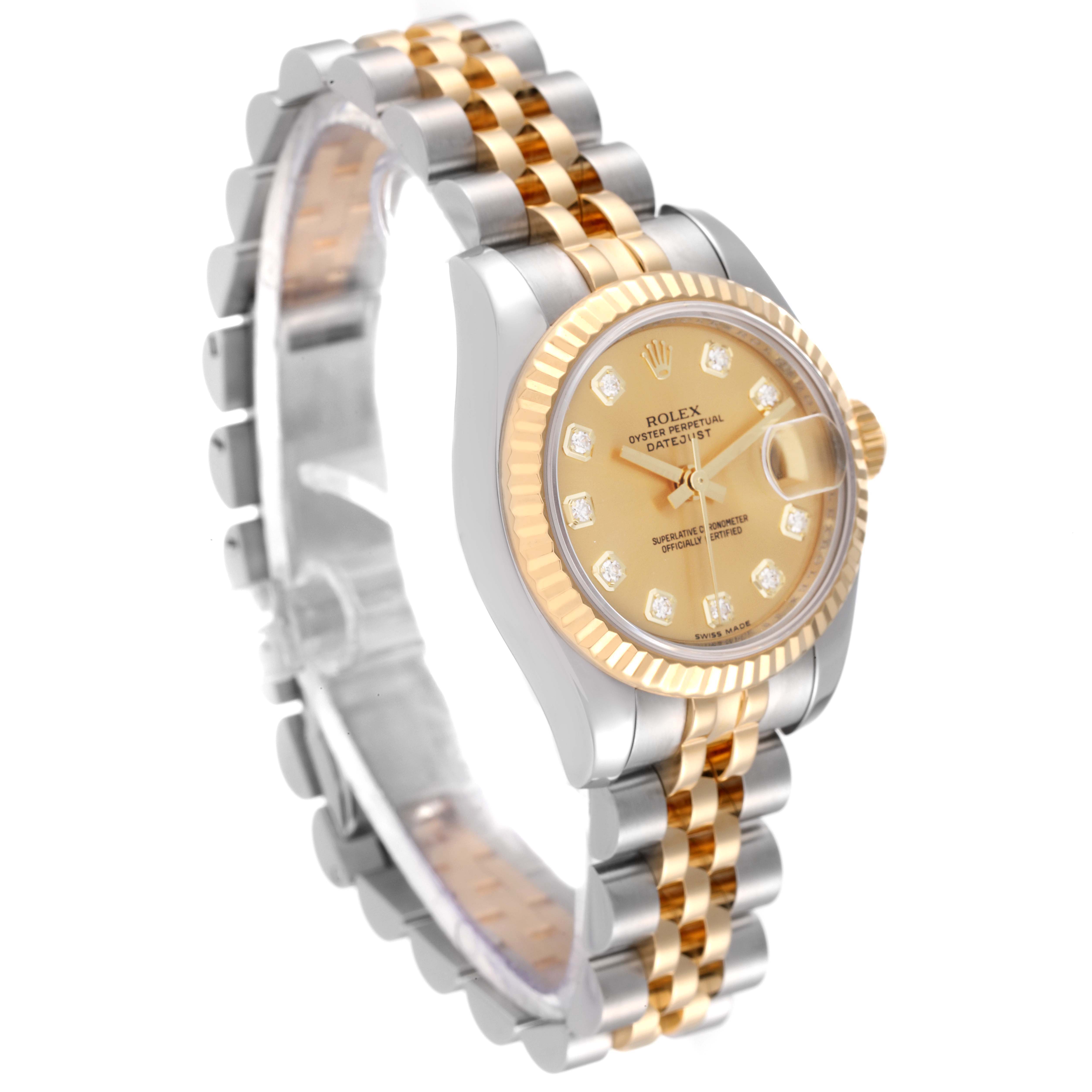 The Rolex Datejust 179173 Women's Steel and Gold (two tone) Champagne Dial 179173 Women's Steel and Gold (two tone) Champagne Dial watch is shown from an angled side view, highlighting its two-tone bracelet and fluted bezel.