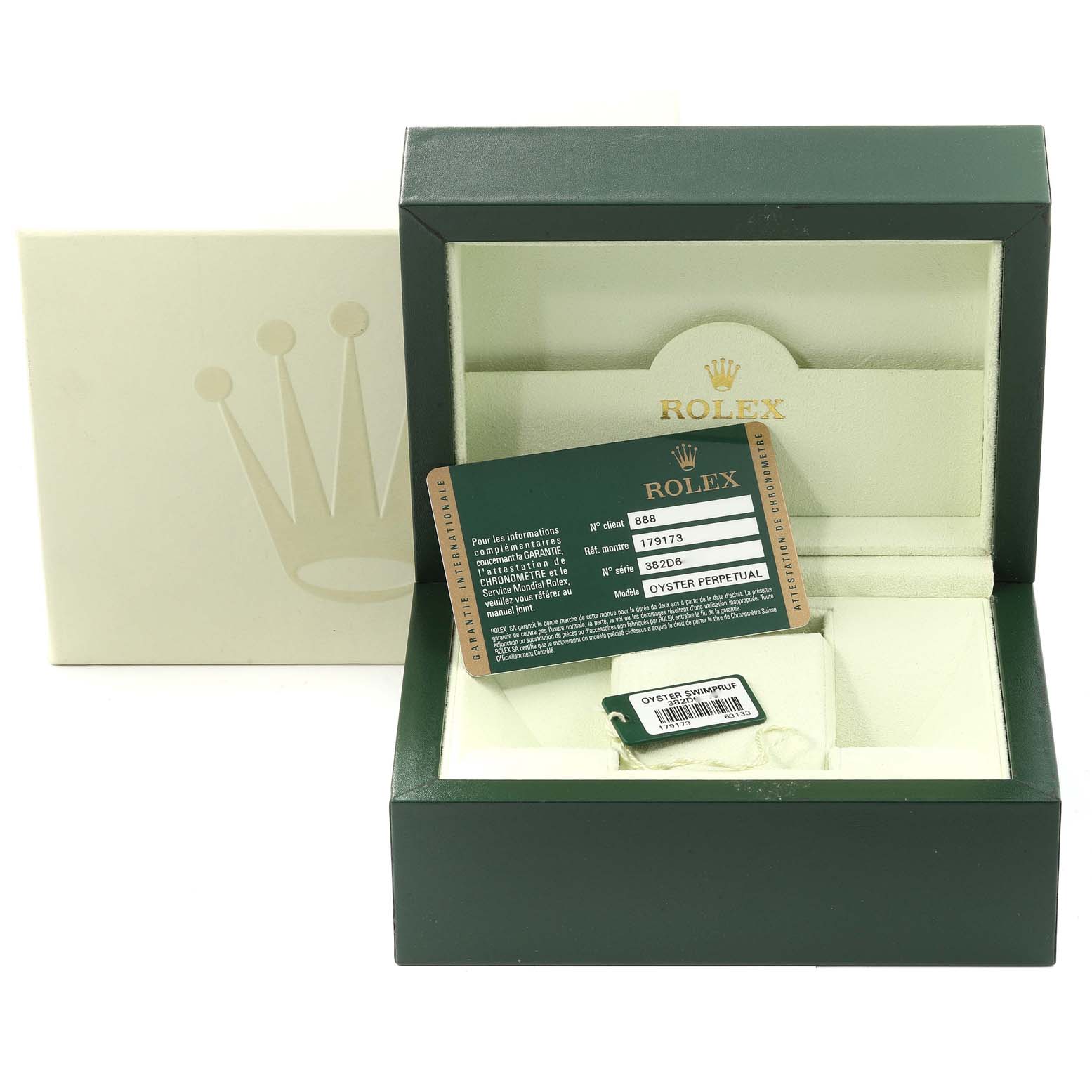 This image shows the Rolex Datejust 179173 Women's Steel and Gold (two tone) Champagne Dial 179173 Women's Steel and Gold (two tone) Champagne Dial watch box, warranty card, and accessories from a front angle.