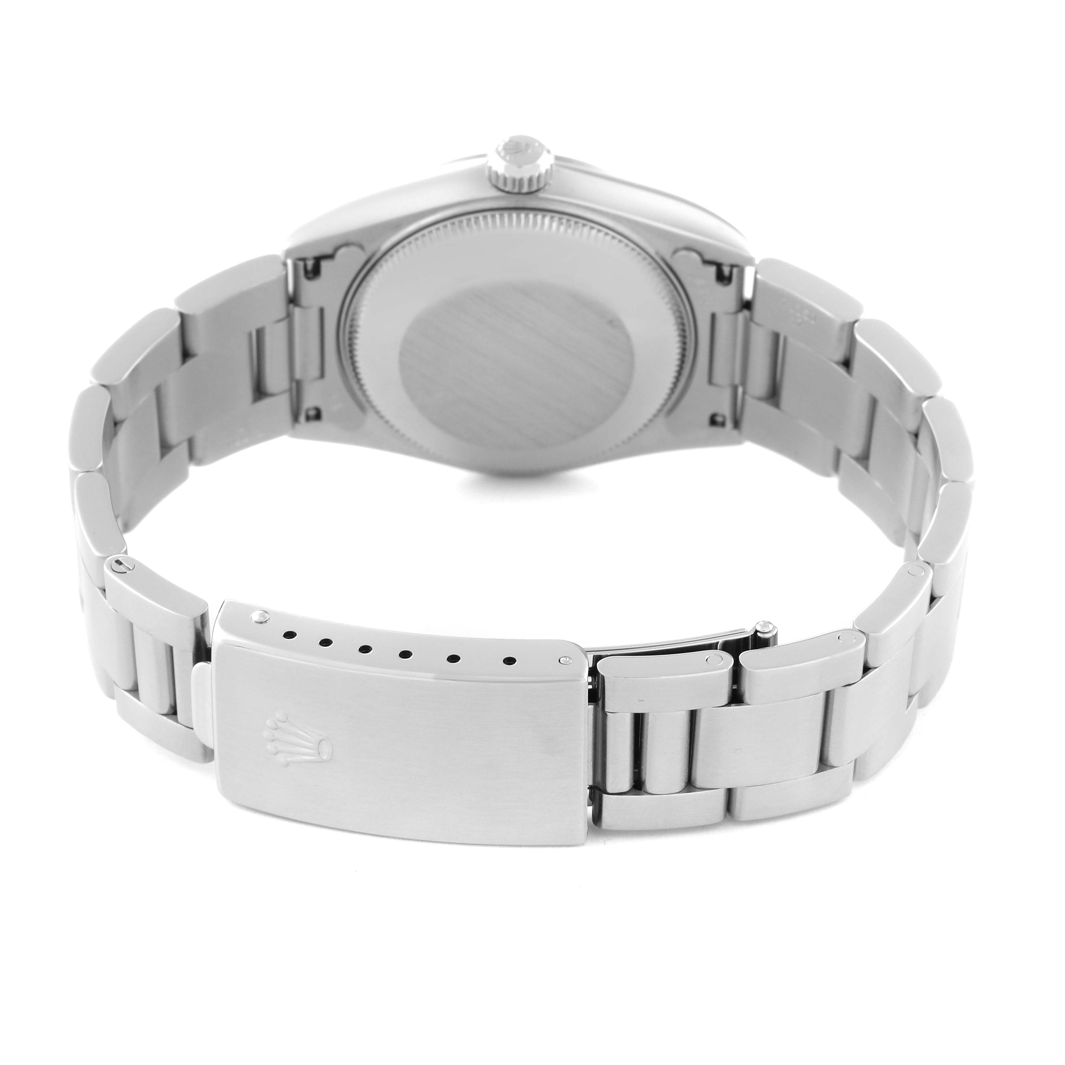 This image shows the back view of a Rolex Mid-Size 78240 Women's Stainless Steel Pink Dial 78240 Women's Stainless Steel Pink Dial watch, highlighting the case back and metal bracelet with clasp.