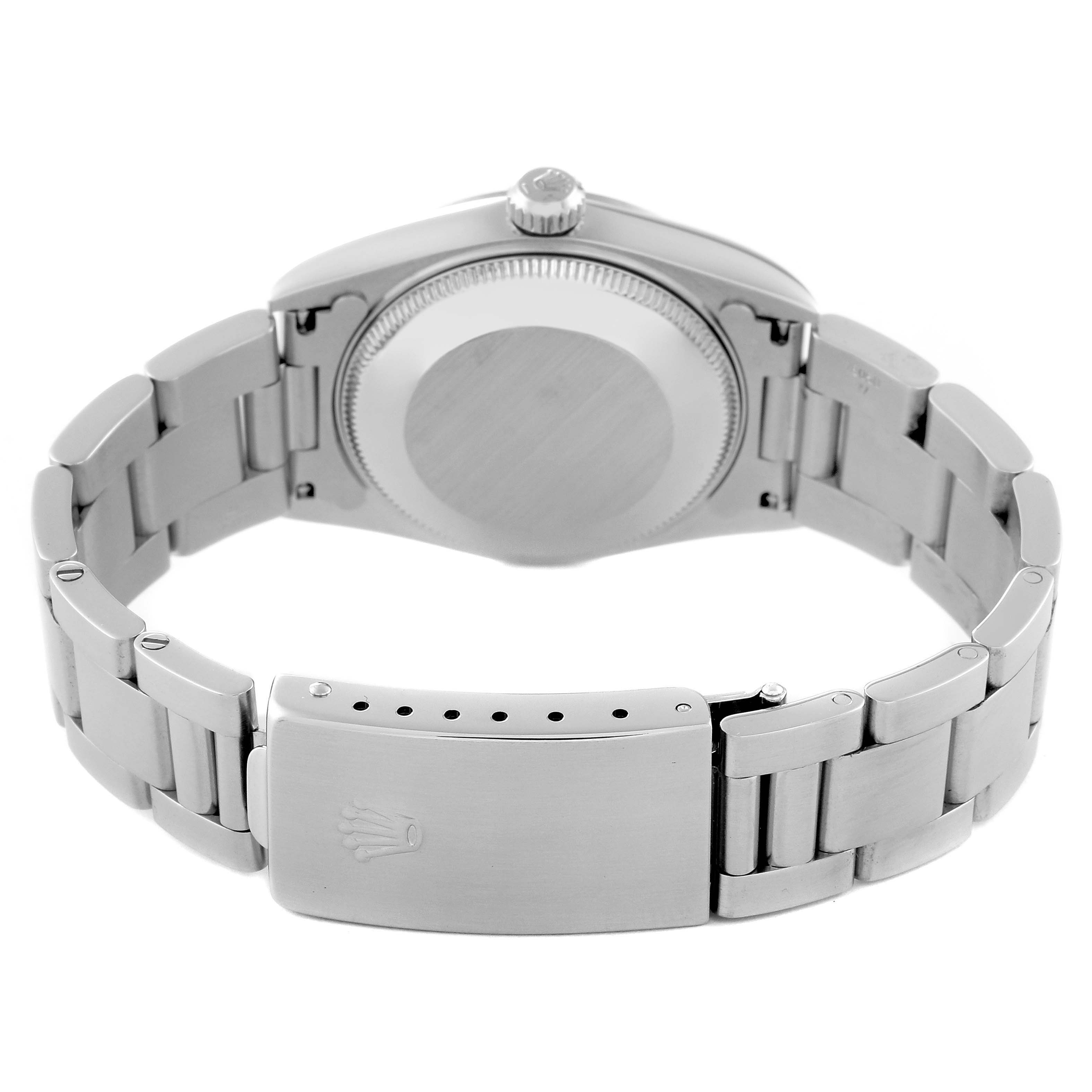 The image shows the back view of a Rolex Mid-Size 78240 Women's Stainless Steel Silver Dial 78240 Women's Stainless Steel Silver Dial model watch, highlighting the case back, bracelet, and clasp.