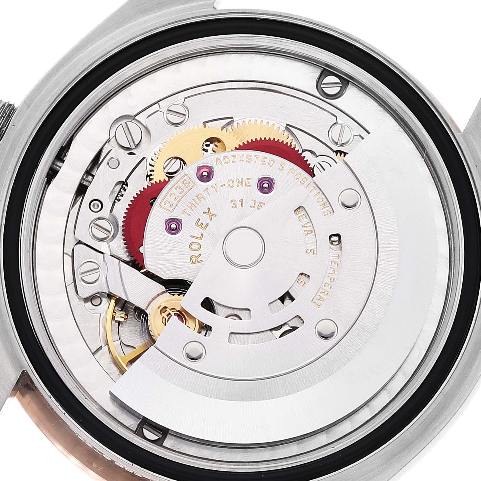 This image shows the internal mechanism of a Rolex Mid-Size 278241 Women's Steel and Gold (two tone) Silver Dial 278241 Women's Steel and Gold (two tone) Silver Dial watch viewed from the back.