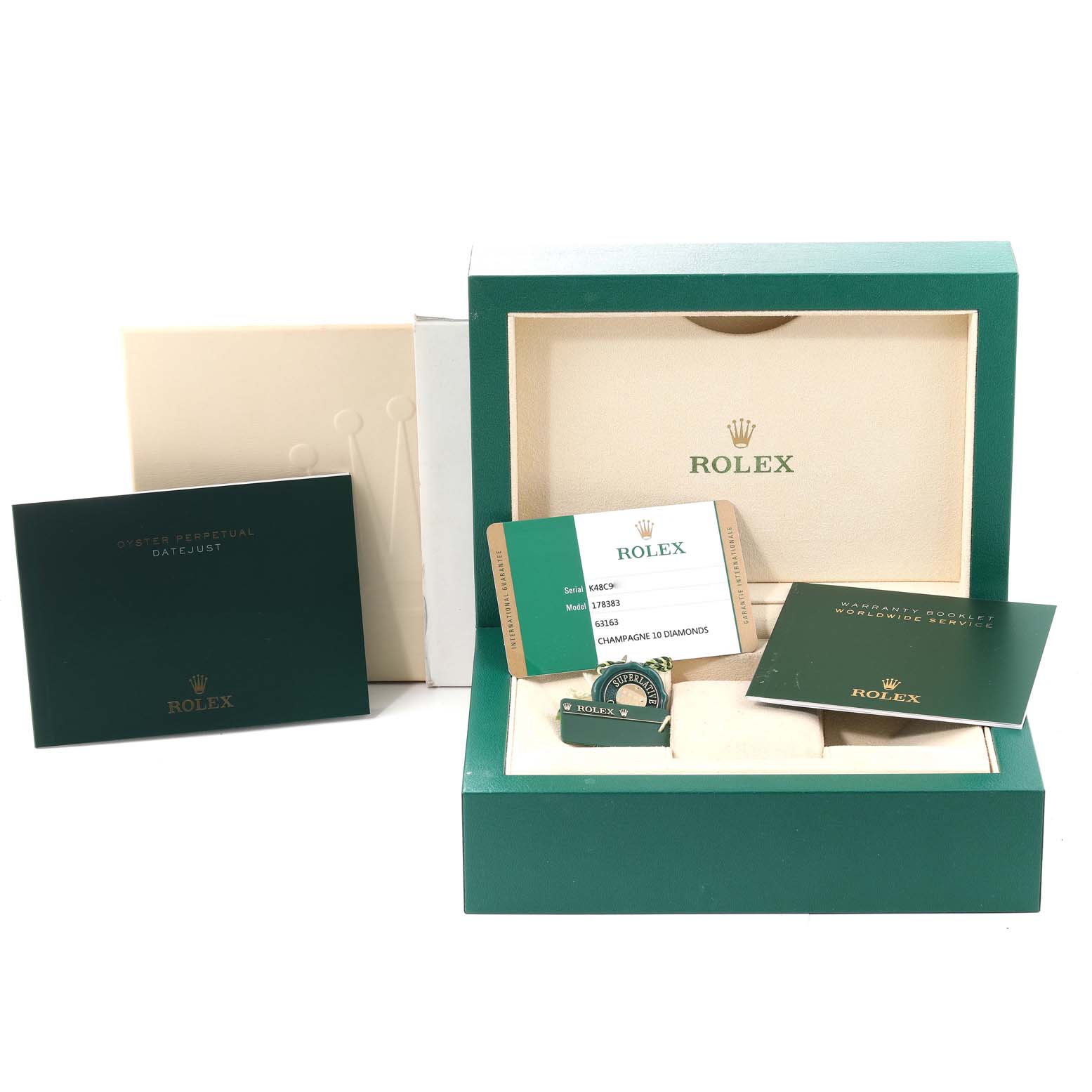 The image shows the packaging and accessories for a Rolex Mid-Size 178383 Women's Steel and Gold (two tone) Champagne Dial 178383 Women's Steel and Gold (two tone) Champagne Dial Datejust, including the box, manuals, warranty card, and tag.