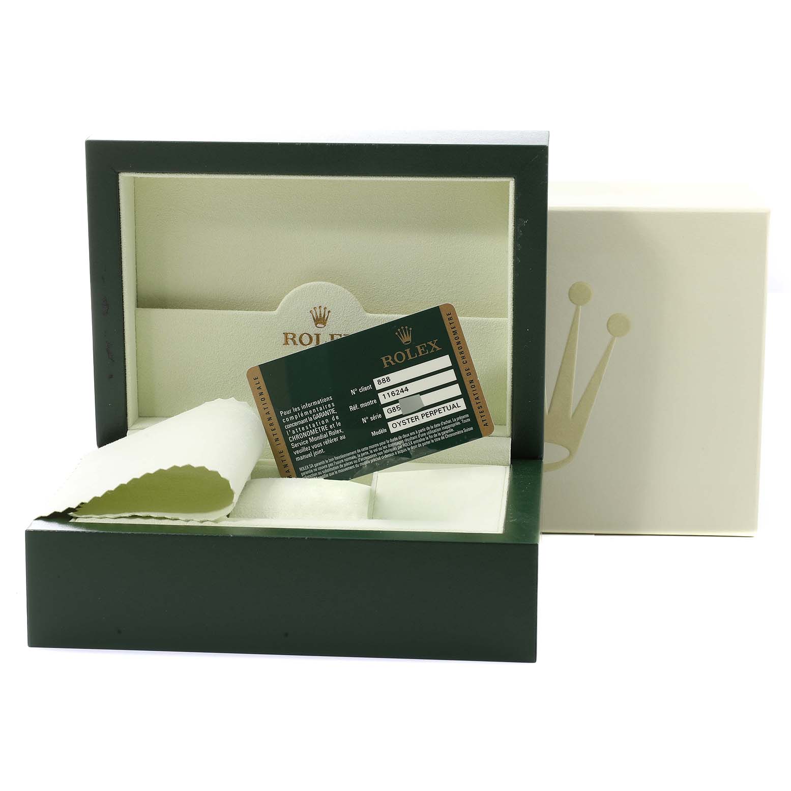 This image shows the open box, warranty card, and cleaning cloth for the Rolex Datejust 116244 Men's Stainless Steel Silver Dial 116244 Men's Stainless Steel Silver Dial watch.