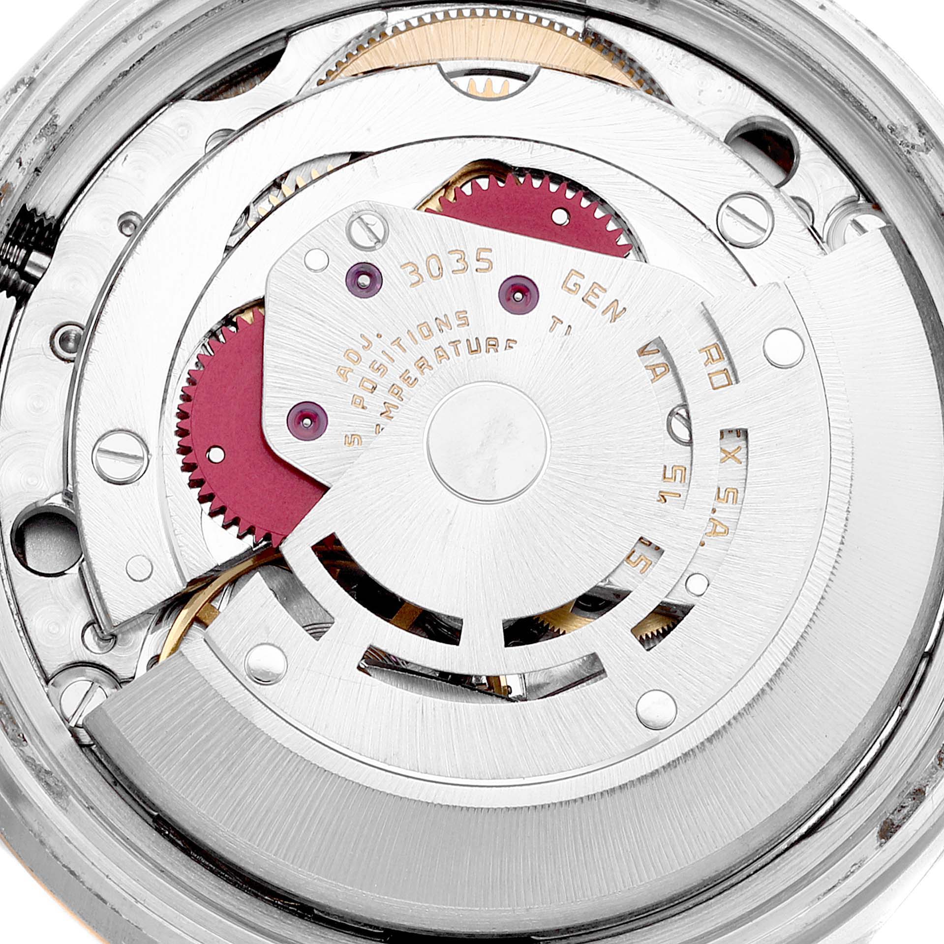 This image shows the internal movement mechanism of a Vintage Collection Rolex watch, highlighting gears and intricate components.