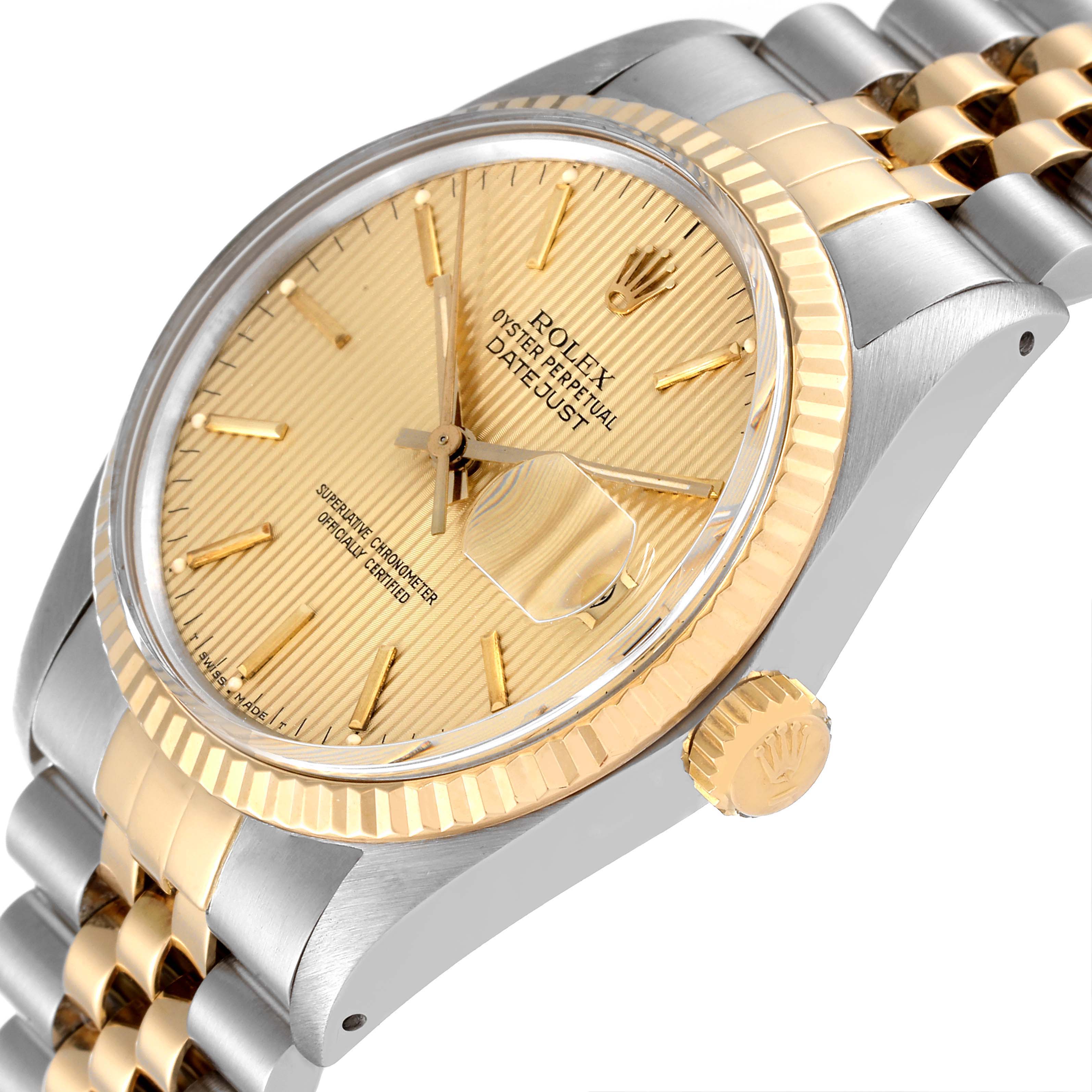 The Rolex Vintage Collection 16013 Men
s Steel and Gold (two tone) Champagne Dial 16013 Men
s Steel and Gold (two tone) Champagne Dial watch is shown at an angle highlighting its gold fluted bezel, champagne dial, and two-tone bracelet.
