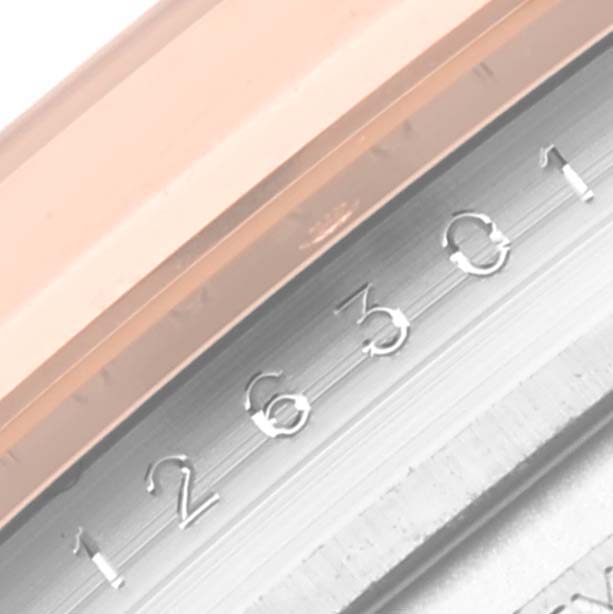 This image shows a close-up of the bezel and model number (126301) engraving of a Rolex Datejust 41 126301 Men
s Steel and Gold (two tone) Brown Dial 126301 Men
s Steel and Gold (two tone) Brown Dial watch.