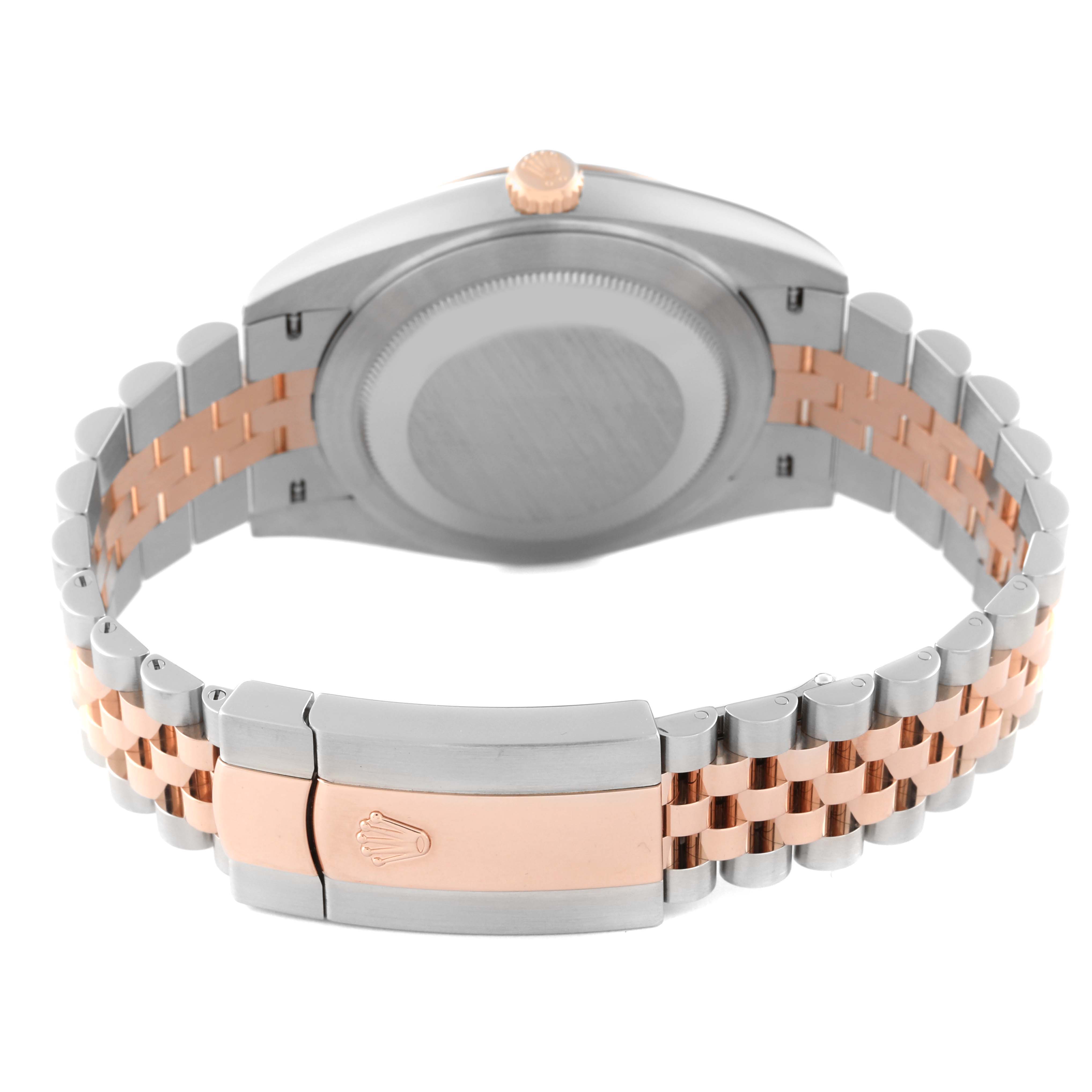 This image shows the back and bracelet clasp of a Rolex Datejust 41 126301 Men
s Steel and Gold (two tone) Brown Dial 126301 Men
s Steel and Gold (two tone) Brown Dial watch, highlighting its two-tone design.