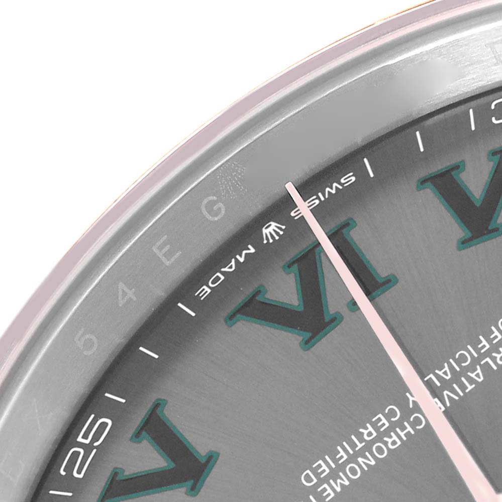 This image shows a close-up of the Rolex Datejust 41 126301 Men's Steel and Gold (two tone) Grey Dial watch's edge, focusing on the dial, Roman numerals, and second hand.