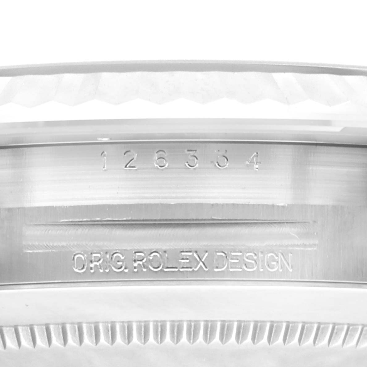 The image shows a close-up of the side of the case for the Rolex Datejust 41 126334 Men's Stainless Steel Black Dial 126334 Men's Stainless Steel Black Dial, highlighting the model number and "ORIG. ROLEX DESIGN" engraving.