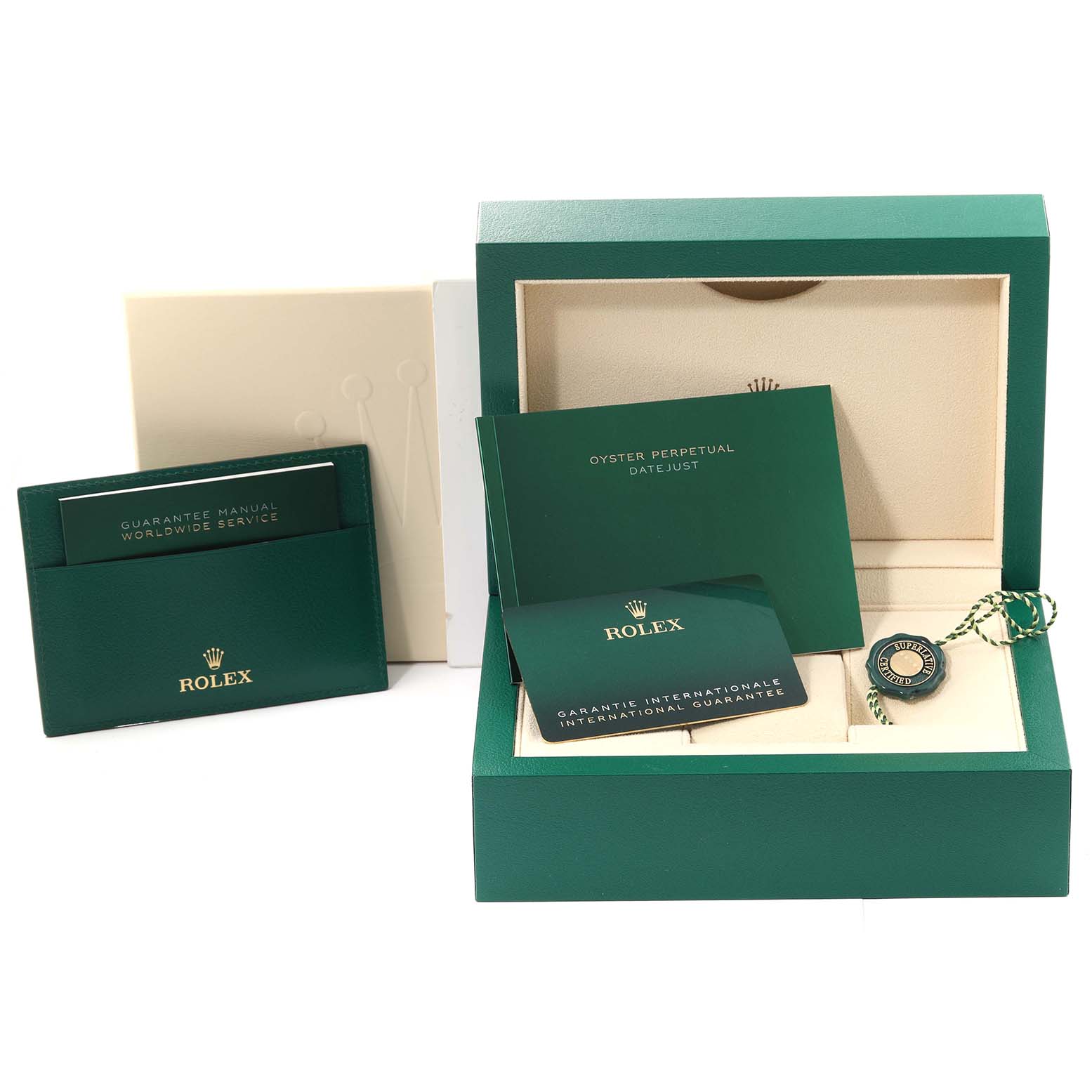The image shows the green box, guarantee manual, and other accessories for the Rolex Datejust 41 126334 Men's Stainless Steel Black Dial 126334 Men's Stainless Steel Black Dial model.