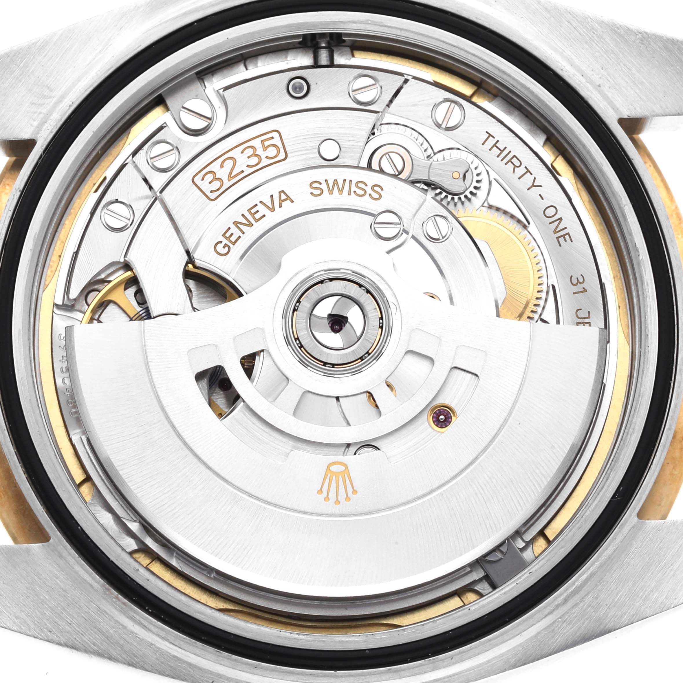 The image shows the back view of the Rolex Datejust 41 126333 Men's Steel and Gold (two tone) Champagne Dial 126333 Men's Steel and Gold (two tone) Champagne Dial, focusing on the 3235 movement and its components.