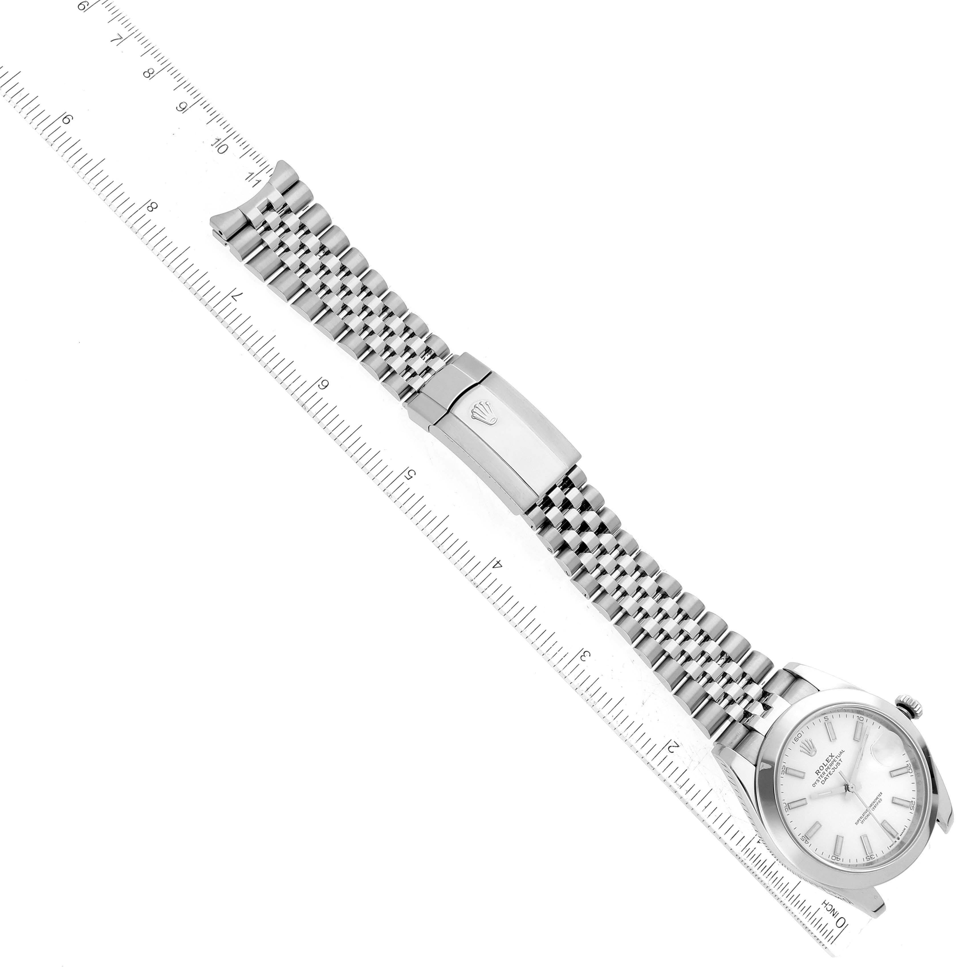 The Rolex Datejust 41 126300 Men's Stainless Steel White Dial 126300 Men's Stainless Steel White Dial watch is shown from a top view alongside a measuring ruler, highlighting the face, bracelet, and clasp.