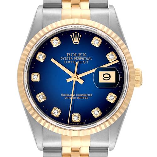 This image shows a front view of a Rolex Datejust watch, highlighting its blue dial, gold bezel, jubilee bracelet, and date window.