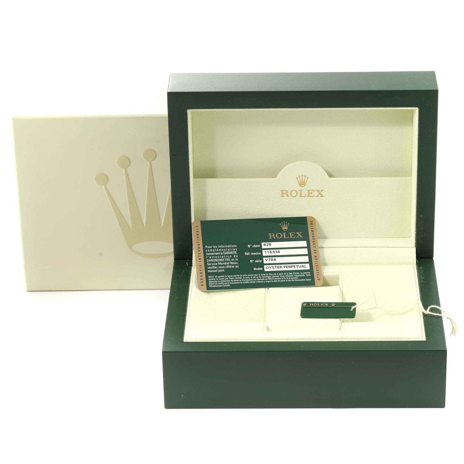 The image shows the open box and accessories of a Rolex Datejust 41 116334 Men
s Stainless Steel Silver Dial 116334 Men
s Stainless Steel Silver Dial watch, with warranty card, box, and tag included.