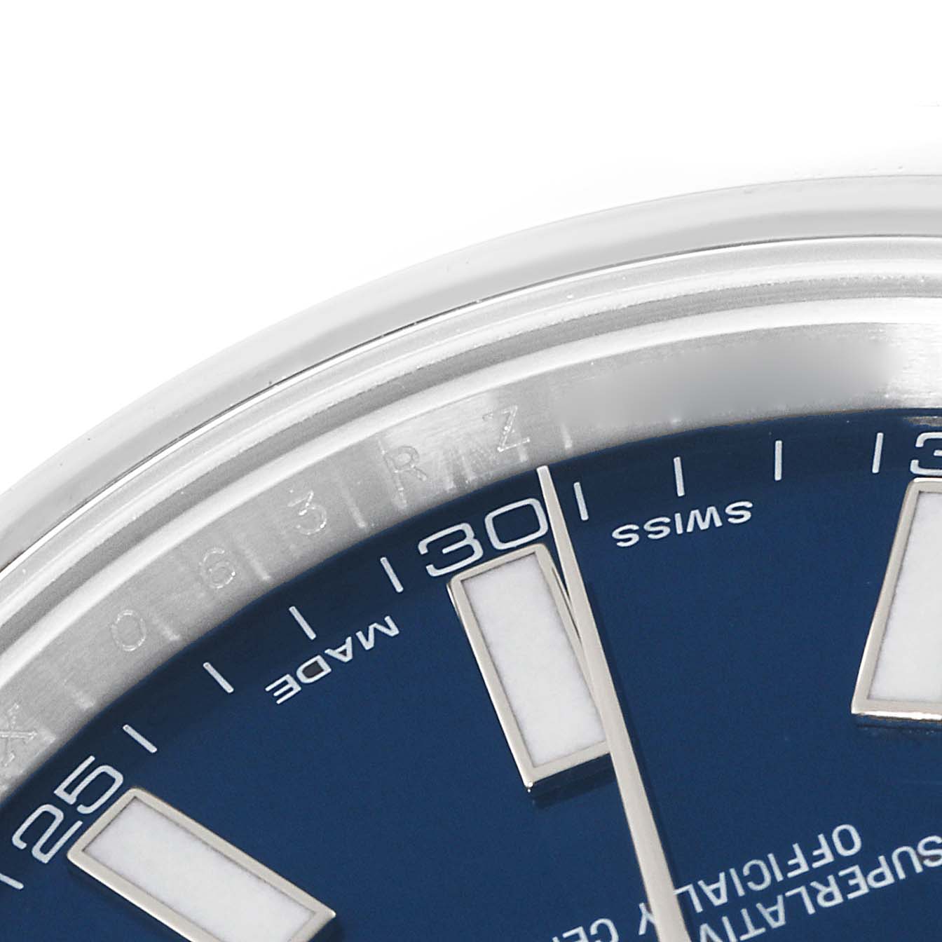 The image shows a close-up of the upper left portion of the dial and bezel of a Rolex Datejust 41 116300 Men's Stainless Steel Blue Dial 116300 Men's Stainless Steel Blue Dial watch.
