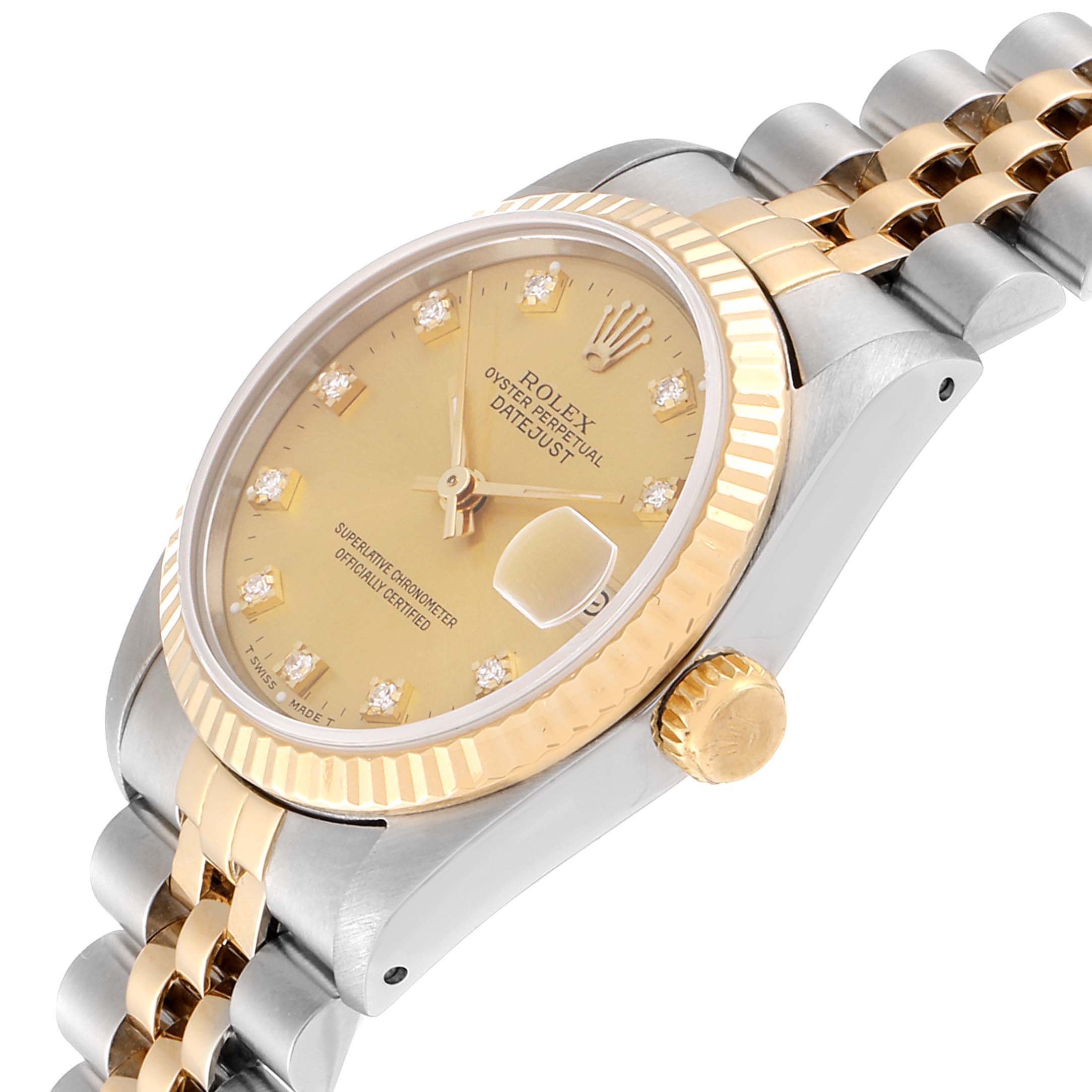 This image shows a close-up of the dial, crown, and part of the bracelet of a Mid-Size Rolex Datejust watch.