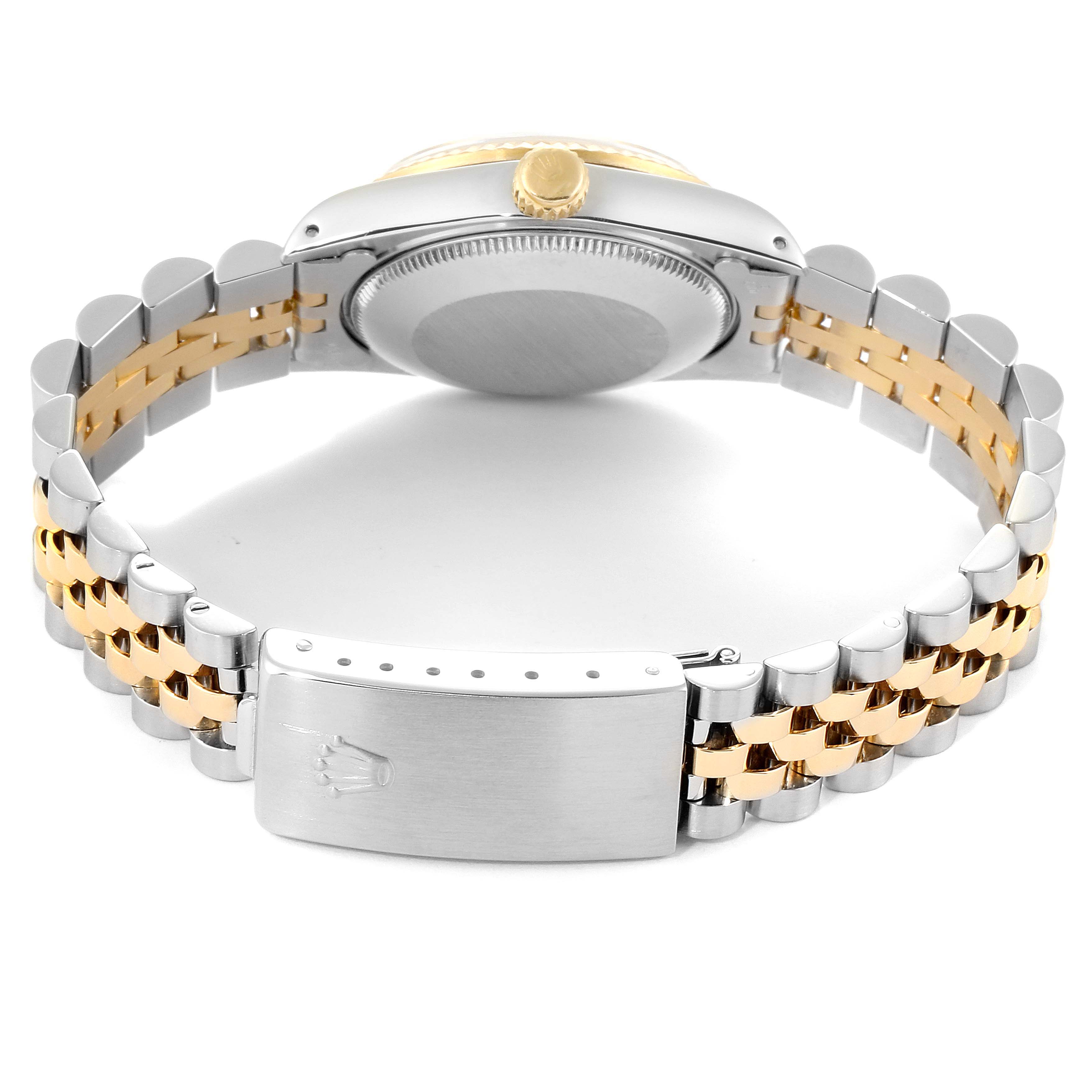This image shows the back view of a Rolex Mid-Size 68273 Women
s Steel and Gold (two tone) Champagne Dial 68273 Women
s Steel and Gold (two tone) Champagne Dial watch, detailing the case back, crown, and two-tone bracelet with clasp.